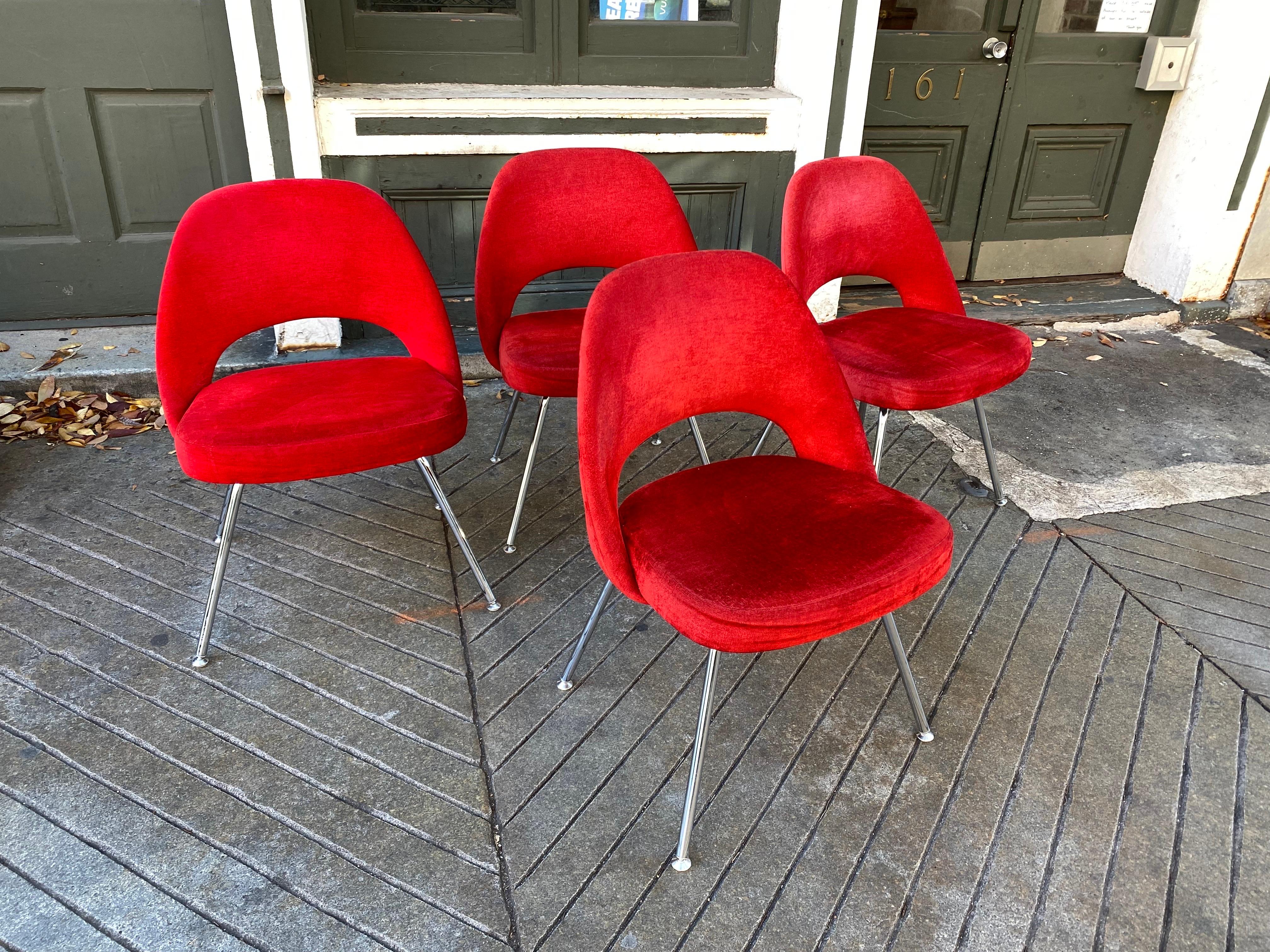 Set of 8 Eero Saarinen Side Dining Chairs for Knoll. This set dates to 2009.  Red velvet material in very nice condition!  Chrome is clean as well!  Chair ready to go!  One of the most comfortable chairs out there!  I use these around my dining