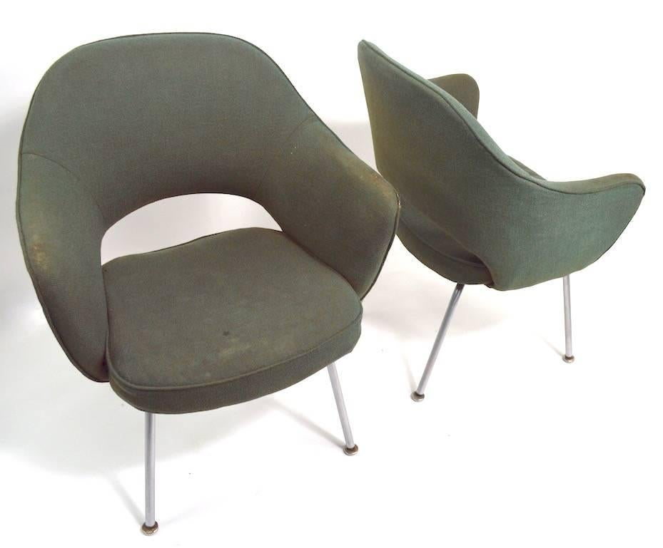 Saarinen design Executive chairs by Knoll. Two available, both will need to be reupholstered as the fabric is worn, and the foam crunchy. Timeless modern design, great form, ready to restore and enjoy. Arm H 25 inch x Seat H 16. Priced and offered