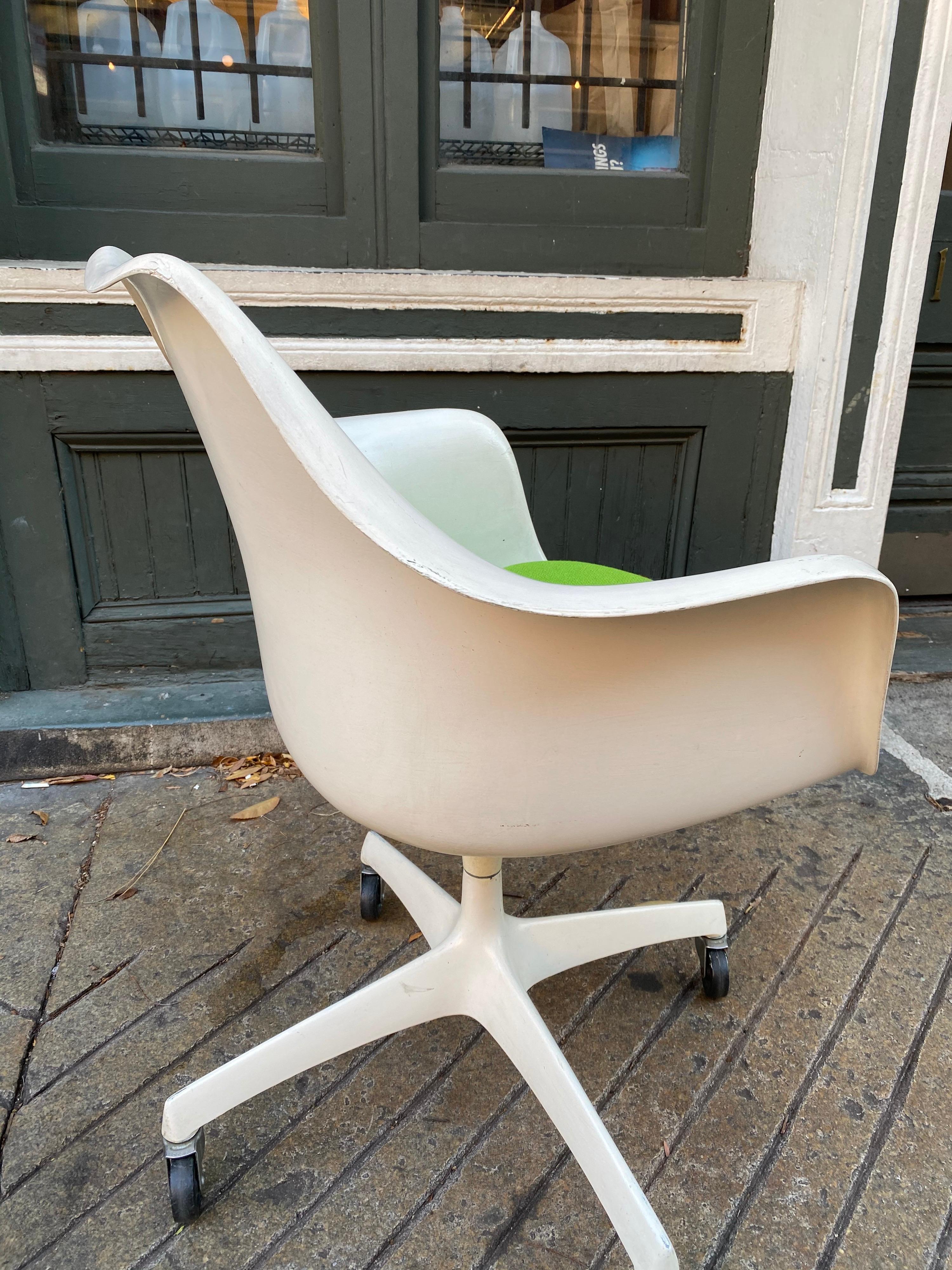 Saarinen for knoll executive desk chair. Rare and uncommon form. Chair produced in 1964 only! Classic tulip design with a rolling base. Retains original label. Chair upper shell has been painted at some point in it's life. Old paint that adds to the