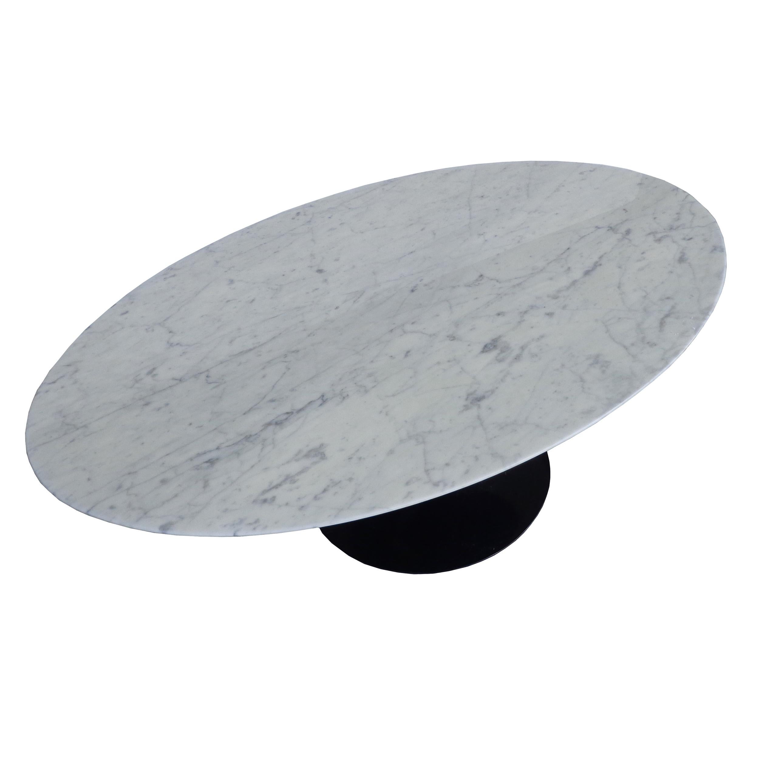 Knoll Studio Saarinen Marble Coffee Table 

Distinct sculptural base inspired by a drop of liquid.
A timeless modern classic in continuous production since 1956.

 
Sturdy, cast-aluminum base 
Solid marble 
Marked Knoll Studio