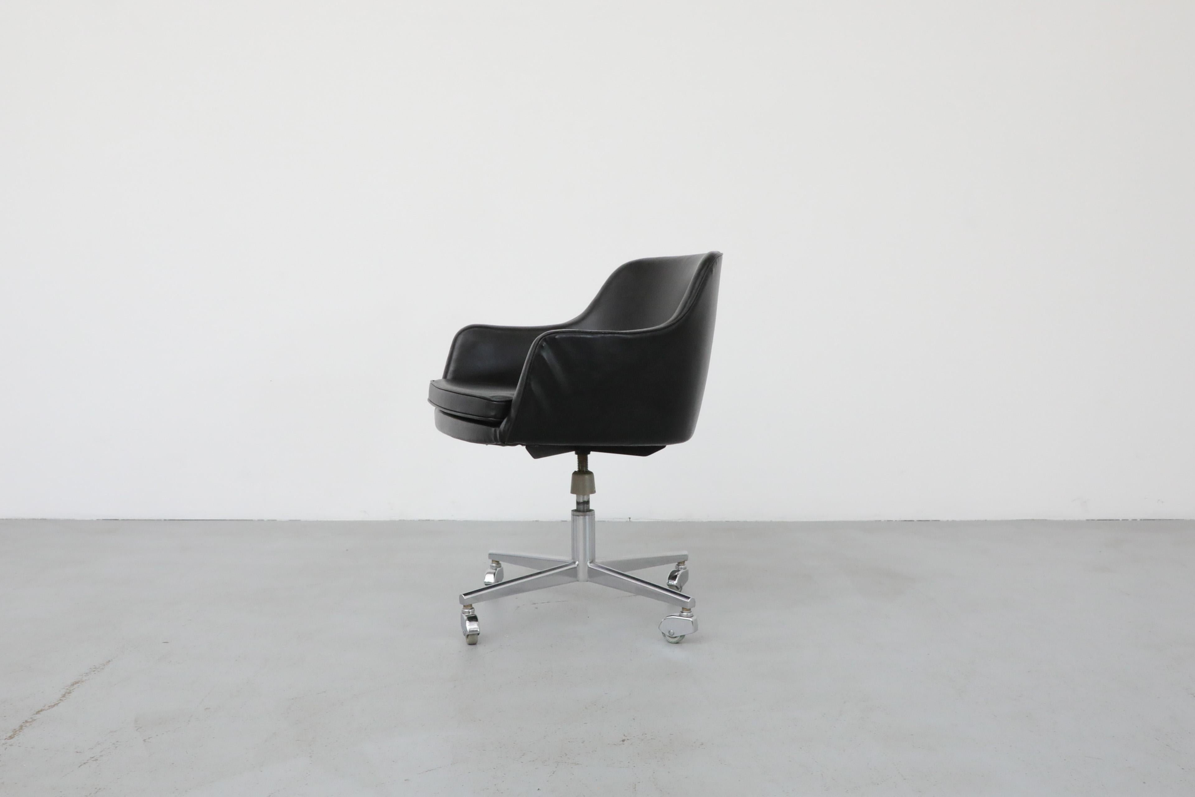 Mid-20th Century Saarinen Style Black Faux Leather Rolling Office Chair w/ Newly Upholstered Seat For Sale