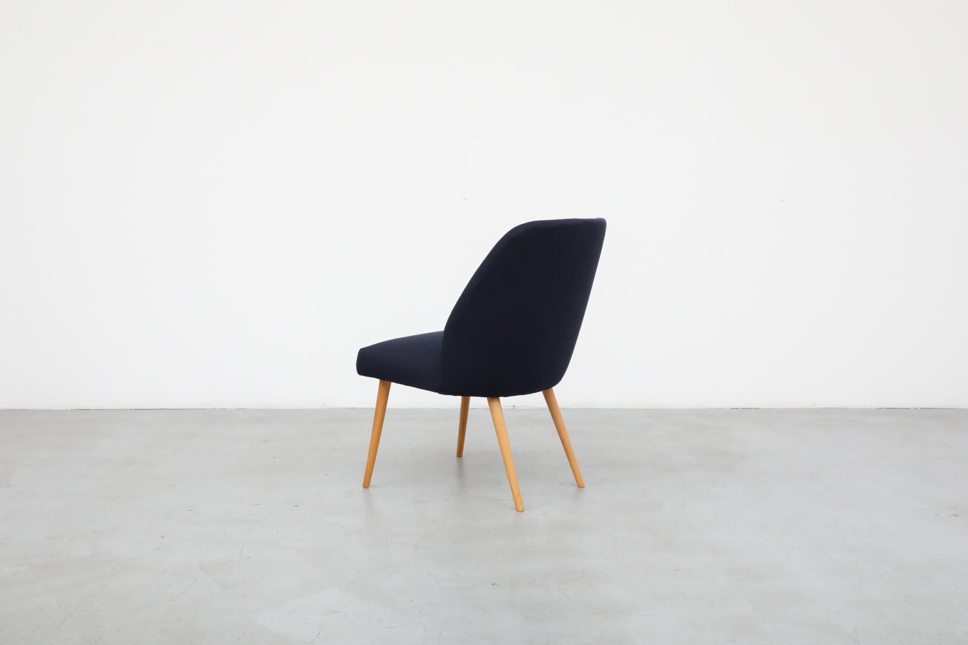 Saarinen Style Navy Upholstered Cocktail Chair with Tapered Natural Birch Legs In Good Condition For Sale In Los Angeles, CA