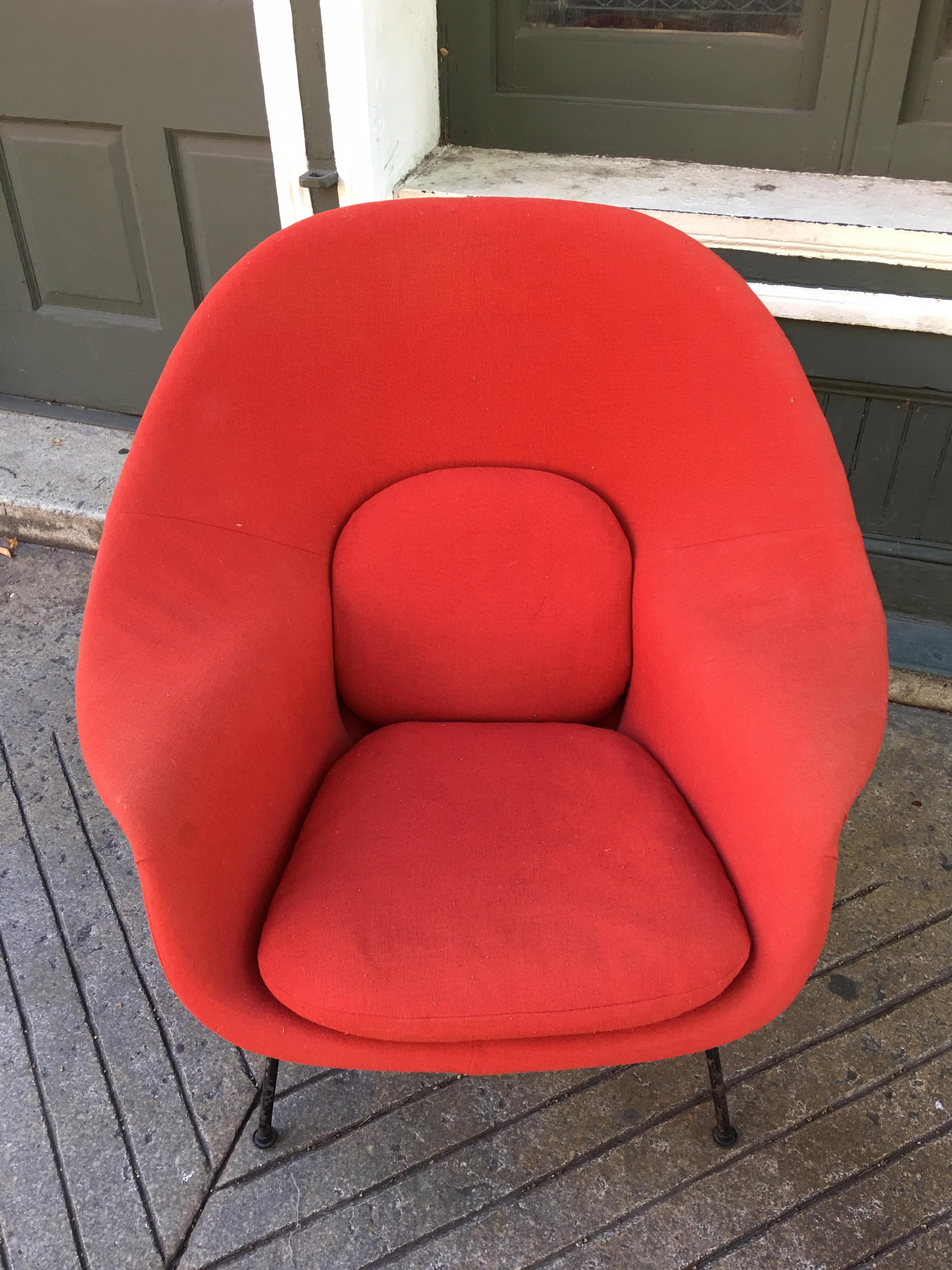 Saarinen for Knoll womb chair and ottoman. Probably re-upholstered 20 years ago in a red fabric. Serviceable condition, but would be great to reupholster! Our Upholsterer is very good at redoing this chair!