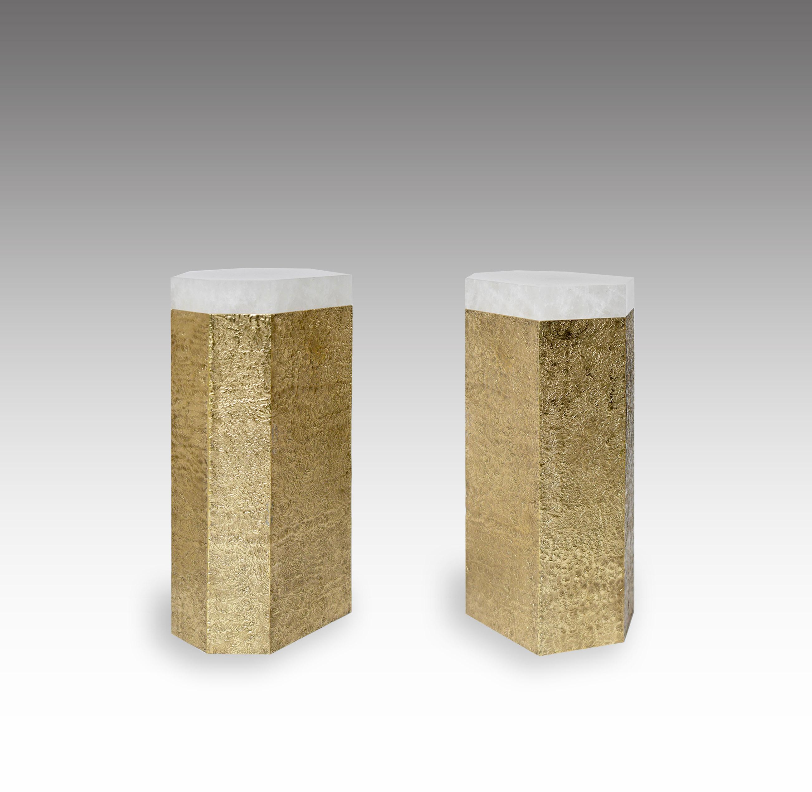 Pair of seven angles rock crystal side table with hammered brass base. Created by Phoenix Gallery.
Can be sold by separated.
Custom size upon request.