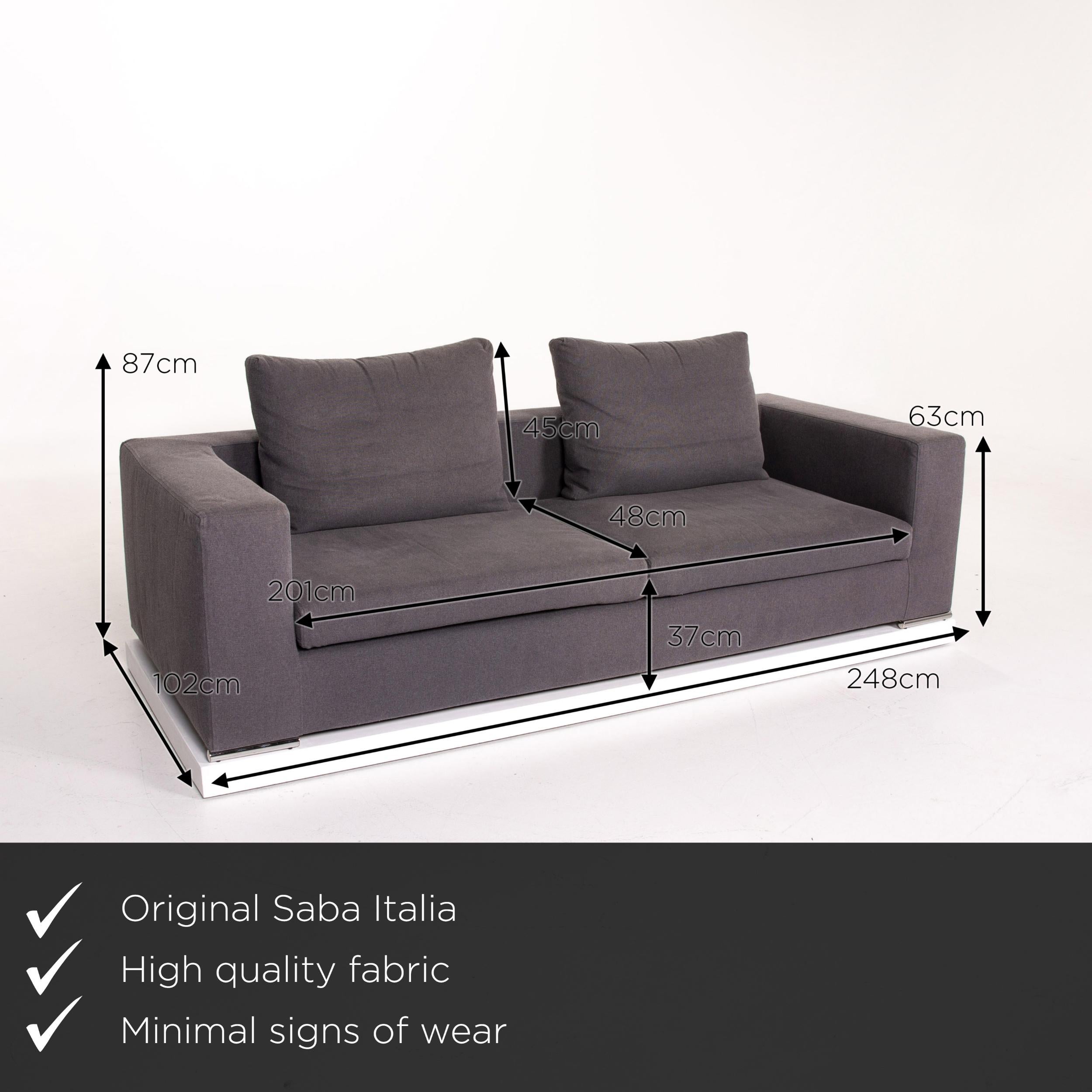We present to you a Saba Italia fabric sofa gray two-seat couch.

 

 Product measurements in centimeters:
 

Depth 102
Width 248
Height 87
Seat height 37
Rest height 63
Seat depth 48
Seat width 201
Back height 45.