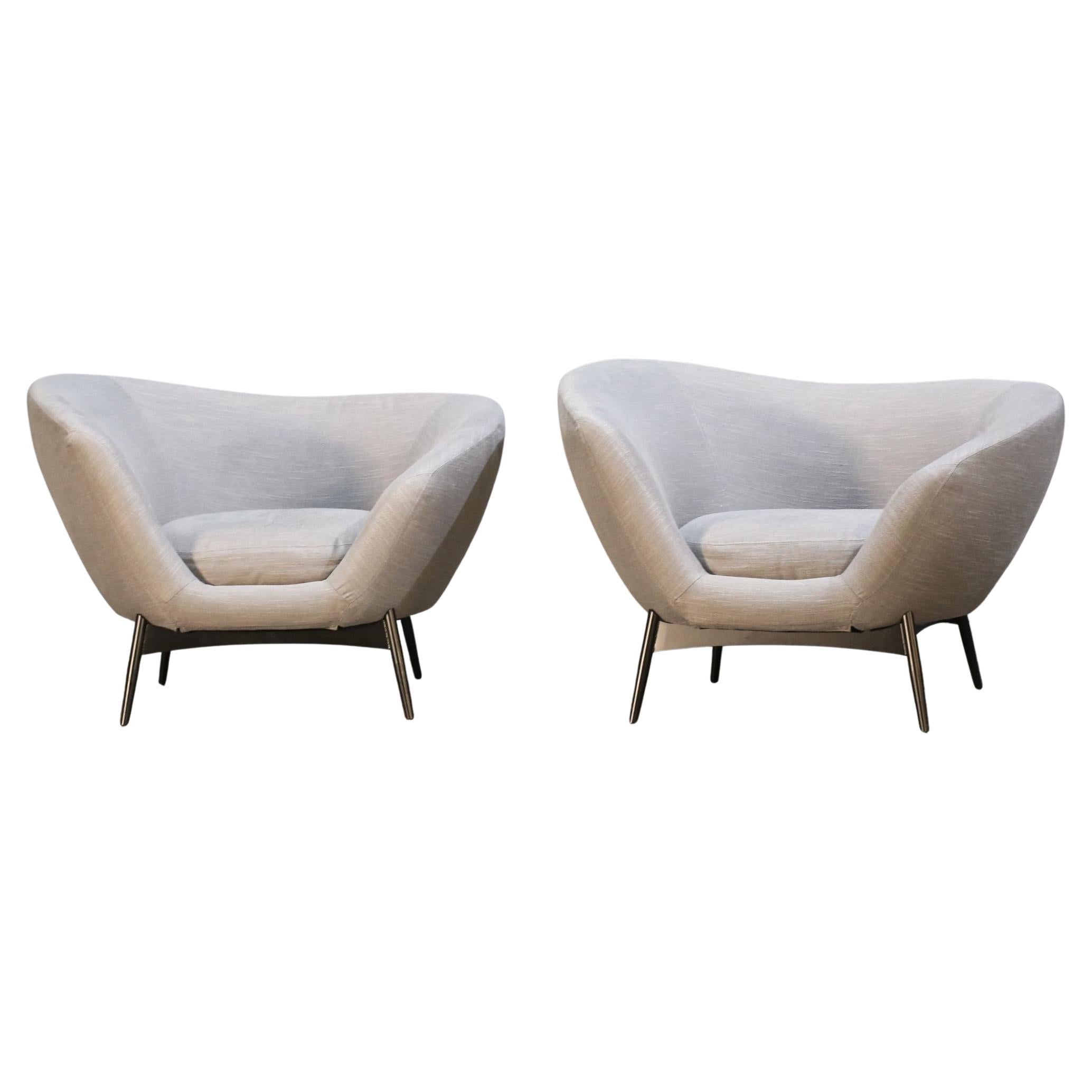 Introducing the stunning Oltremare Armchair by renowned designer Antonio Marras for Saba Italia. This exquisite piece is a true embodiment of luxury and style, featuring a sleek and modern design with a touch of traditional Italian craftsmanship.