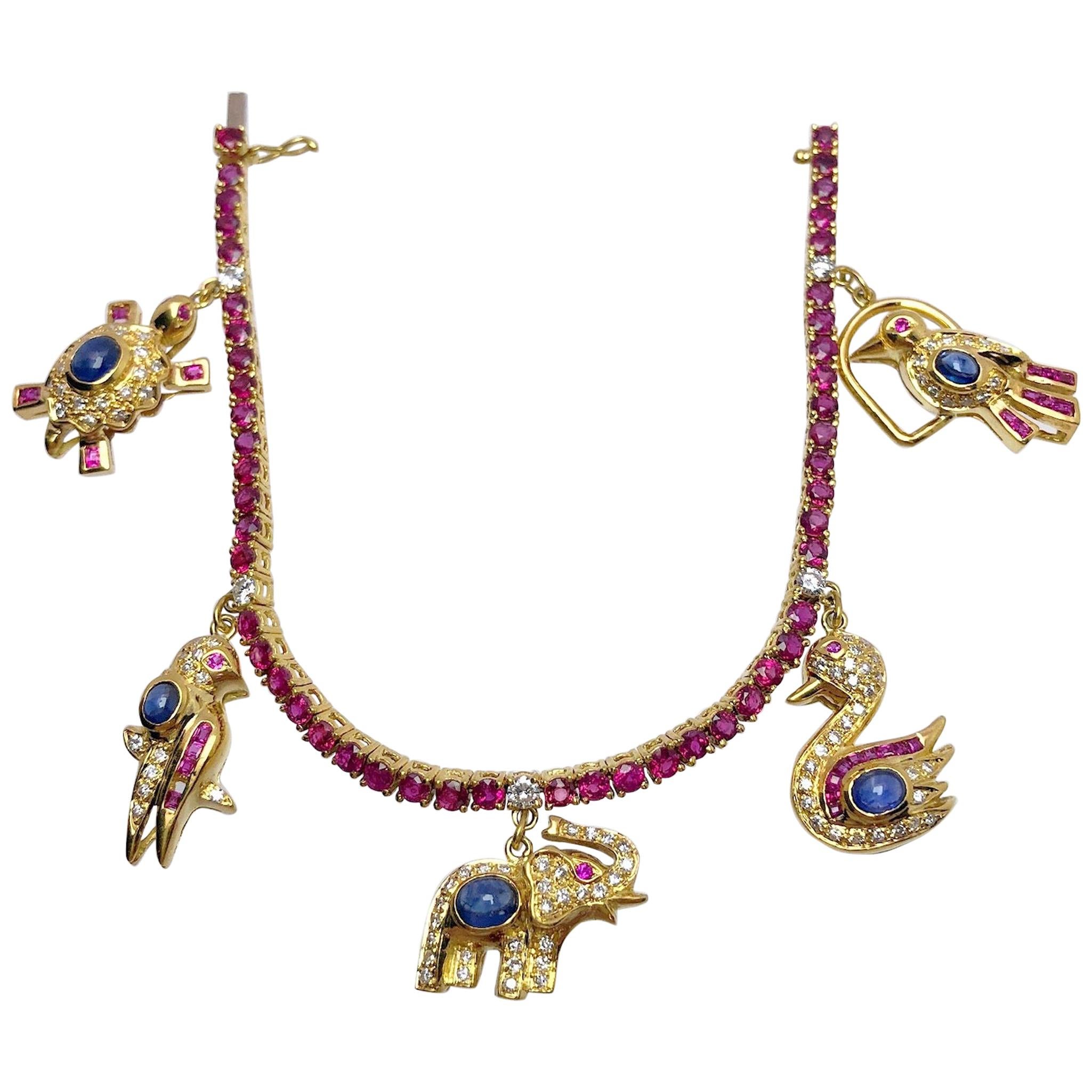 Sabbadini 18 Karat Gold, 1.72CT. Ruby & 5.91Ct. Cabochon Sapphire Charm Bracelet