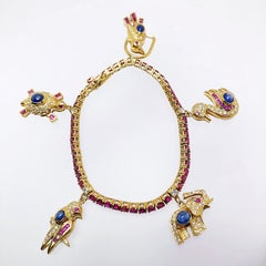 Sabbadini 18 Karat Gold, 1.72CT. Ruby & 5.91Ct. Cabochon Sapphire Charm Bracelet