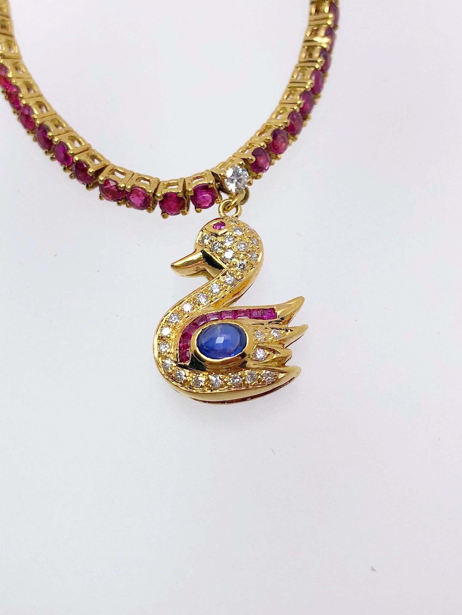 Sabbadini 18 Karat Gold, 1.72CT. Ruby & 5.91Ct. Cabochon Sapphire Charm Bracelet In New Condition In New York, NY