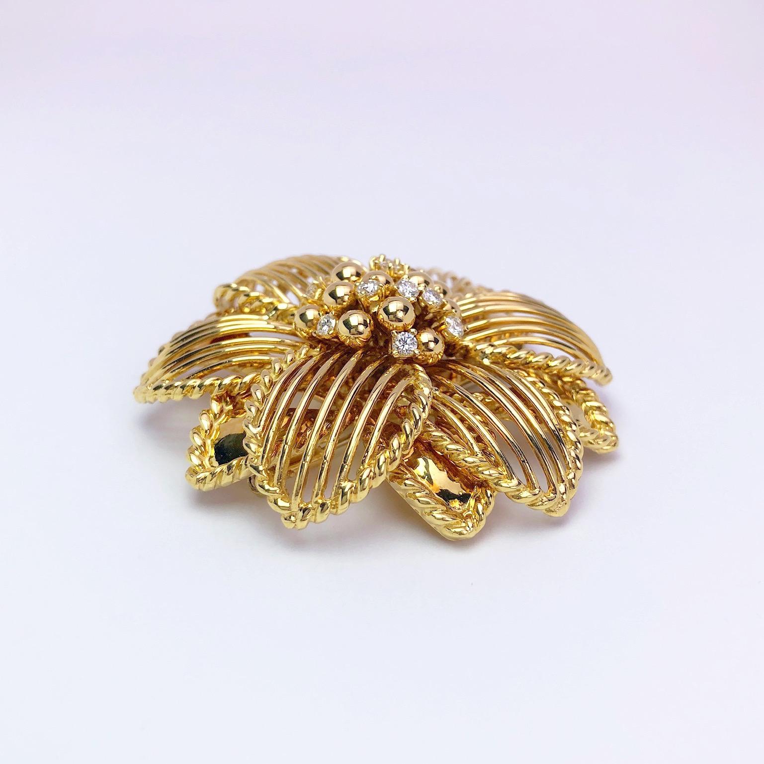 Started in the 1940's Sabbadini of Italy is known throughout the world for their artisinal excellence and creative design.
This 18 karat yellow gold flower brooch is set with 0.95 carats of round brilliant diamonds. The flower measures 2.25