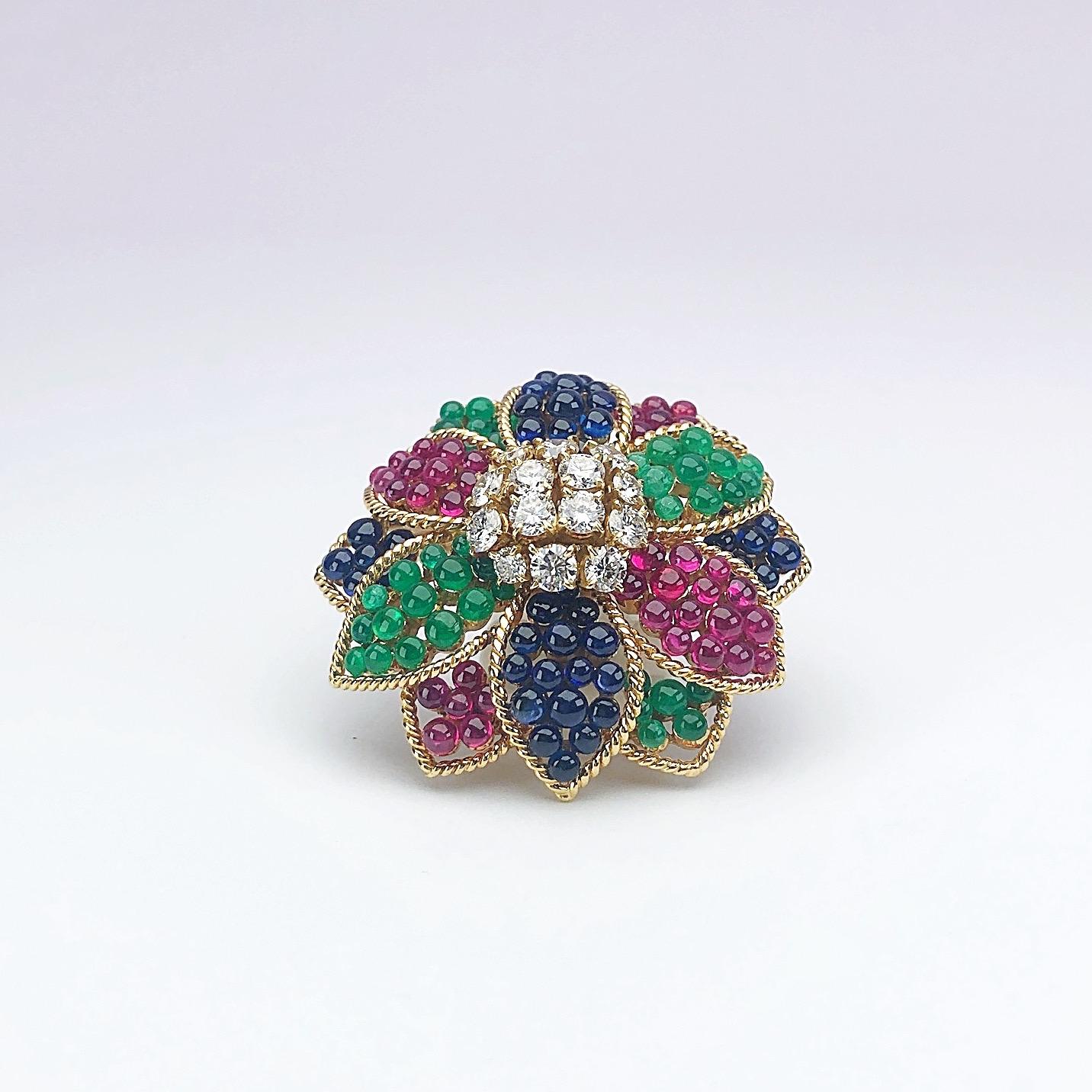 Started in the 1940's Sabbadini of Italy is known throughout the world for their artisinal excellence and creative design.
This unique 18 karat yellow gold flower brooch is a perfect example of their fine craftsmanship. Each petal is set with beaded
