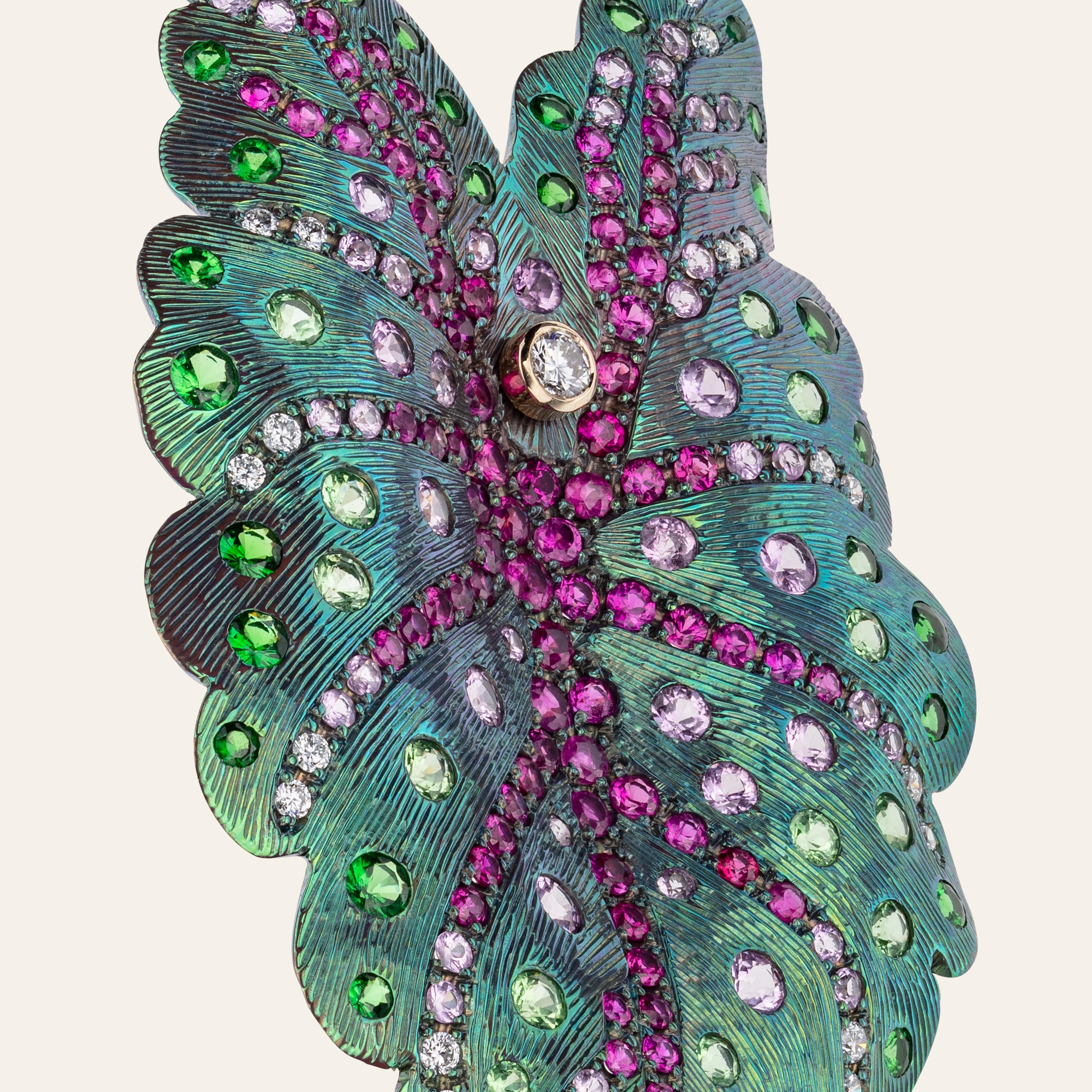 Sabbadini Jewelry Titanium Leaf Earrings
Titanium and 18k yellow gold leaf earrings, round cut diamonds 0,62 carats, pink sapphires 5,78 carats and green garnets 3,99 carats. 
Titanium 12grams; gold 4,72grams
Hand made jewelry & designed in Milan,