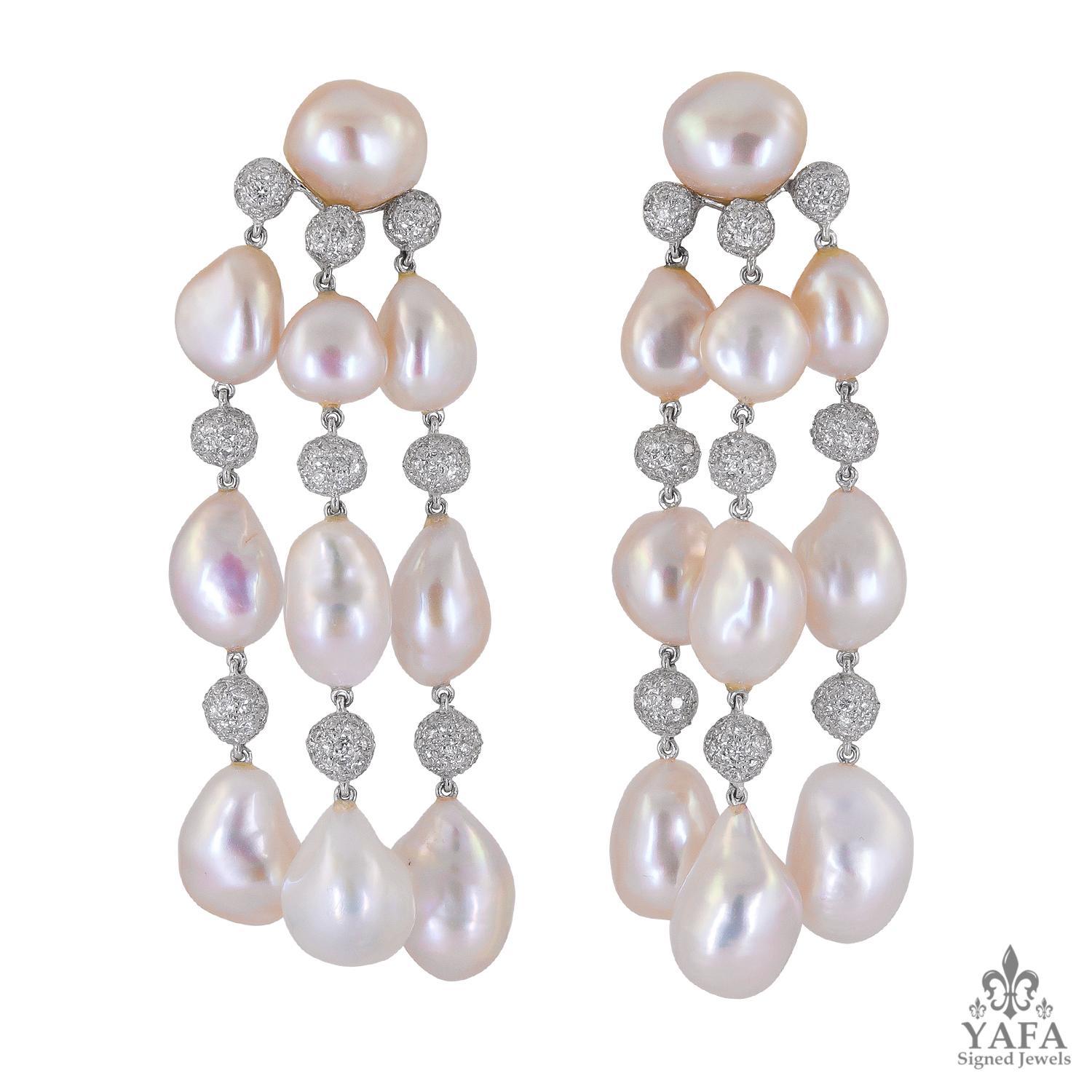 This Italian suite features baroque pearls that stagger organically shaped baubles of diamond-pave. Fluidity in movement is the best way to describe both pieces when worn. The bracelet moves on the wrist, similar to the current of a briny river,