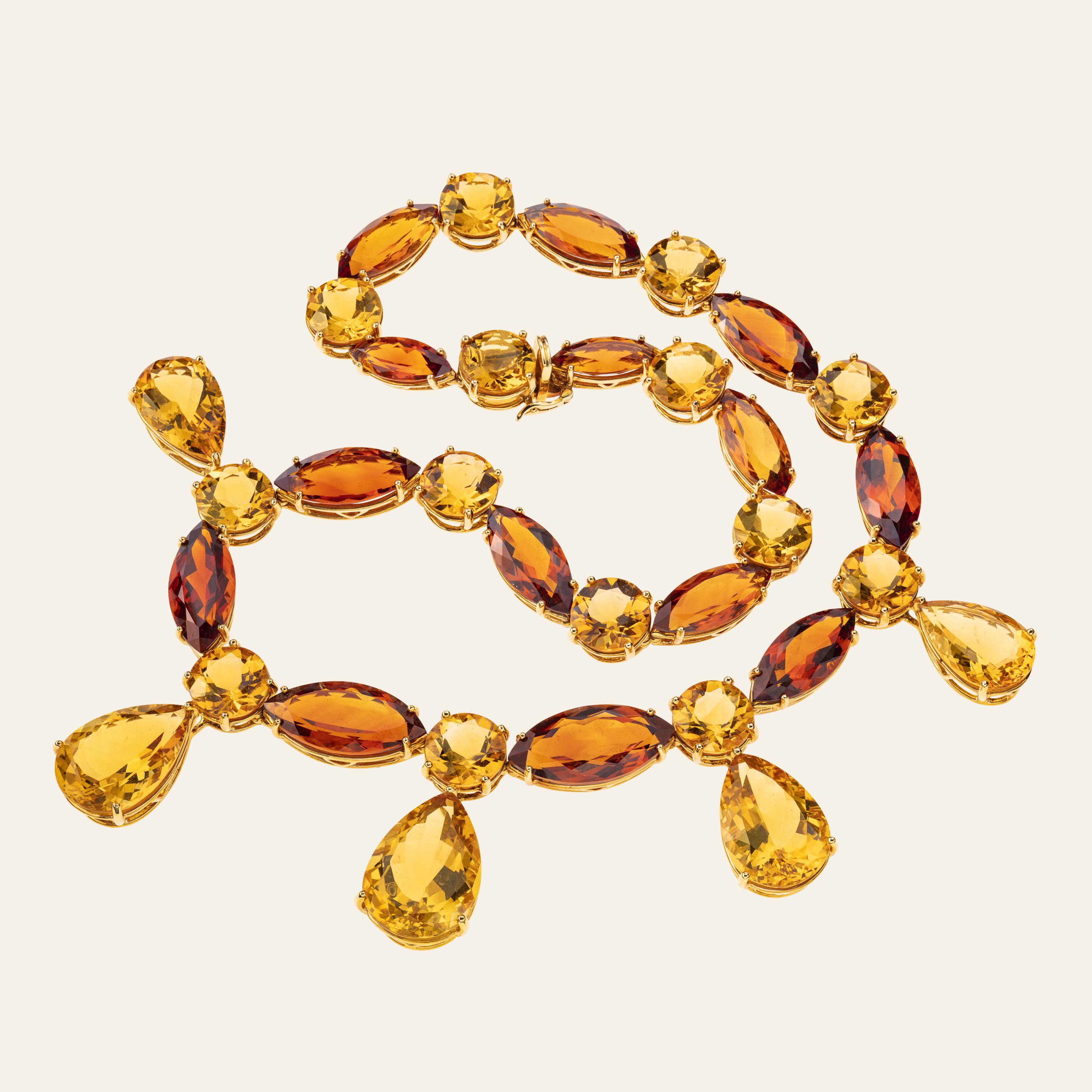 Sabbadini Jewelry 152 Carats Citrine Necklace 
18k Yellow gold necklace, fancy shape cut dark and light citrines 152carats. 
Gold 47,93 grams
Made In Italy
Handmade Jewelry 