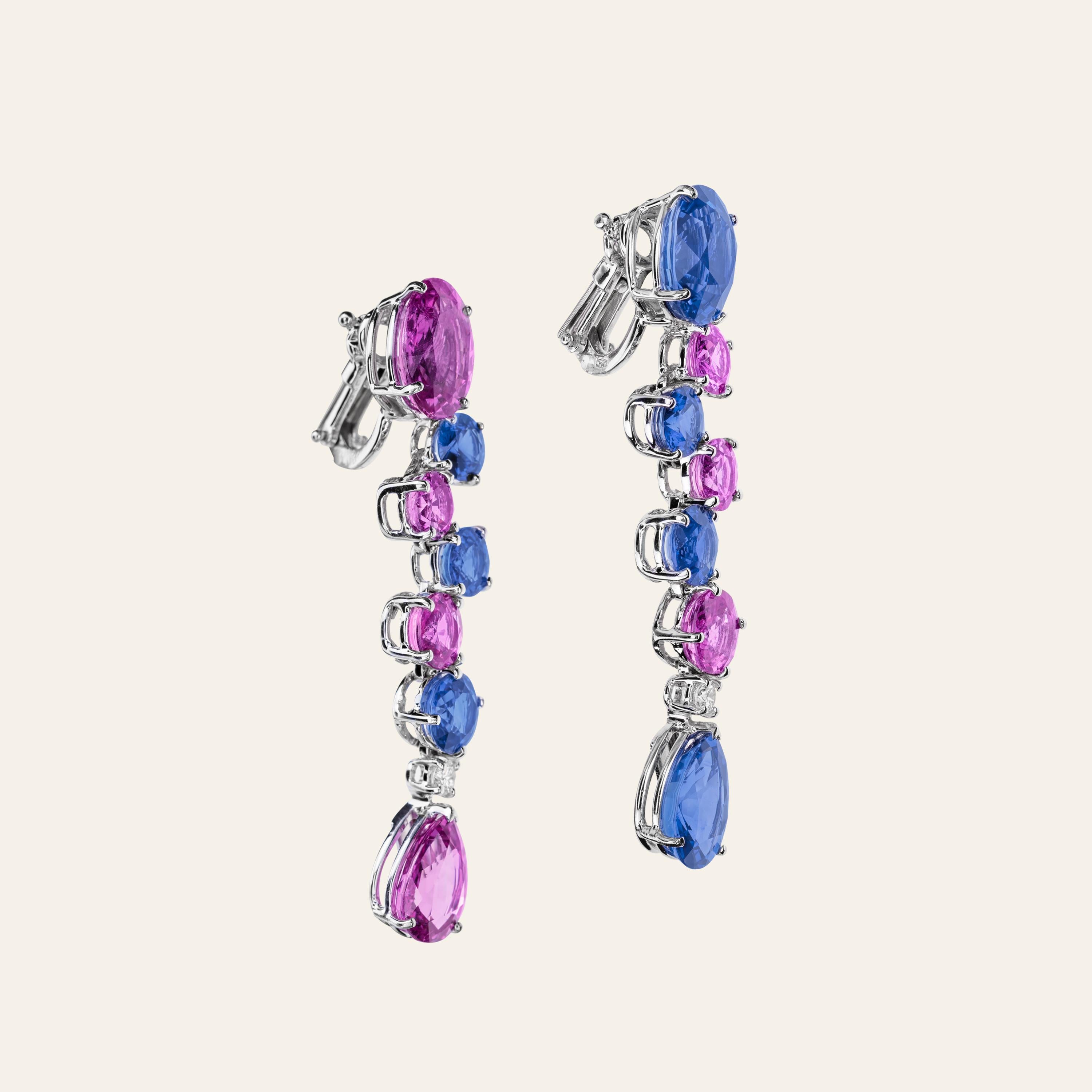 Sabbadini Light Blue And Pink Sapphires Pendant Earrings 
18k White gold earrings. Oval, round and pearshape cut blue and pink Ceylon sapphires 24,62 carats, round cut diamonds 0,19 carats. 
White Gold 22,20grams
Handmade & designed in Milan, in Via