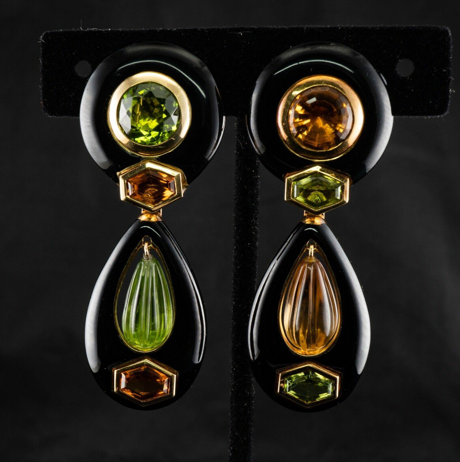 This gorgeous pair of earrings is made by Italian designer jewelry House Sabbadini. The earrings are crafted in solid 18K Yellow gold with black Onyx, genuine Earth mined Peridots and Citrines. The multifaceted Citrine and Peridot on the top measure