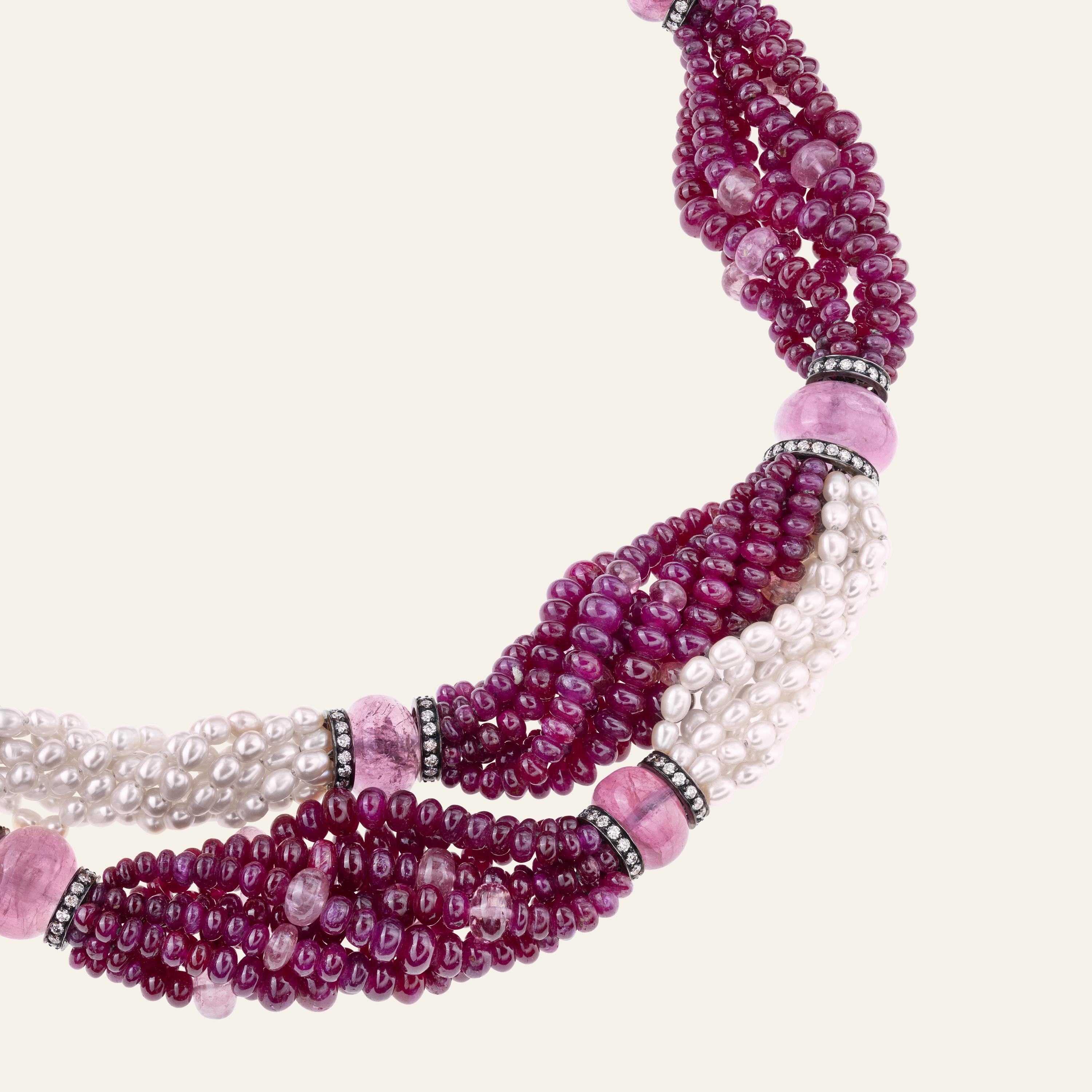 Sabbadini Pearl and Rubies Beaded Chocker Necklace 
Twisted bead necklace, fresh water pink pearls, ruby beads 534,53 carats, pink tourmaline beads, round cut diamonds 4,68 carats, 18k white gold accents. 
Handmade & designed in Milan, in Via