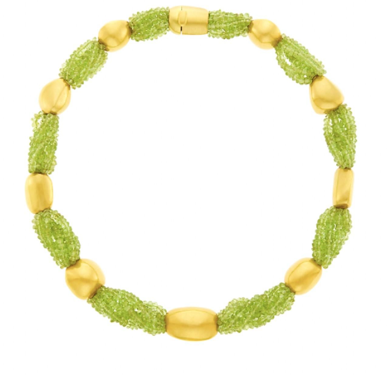 A Multi-Strand Peridot and Gold Bead Necklace by Sabbadini. Made in Italy, circa 1980.