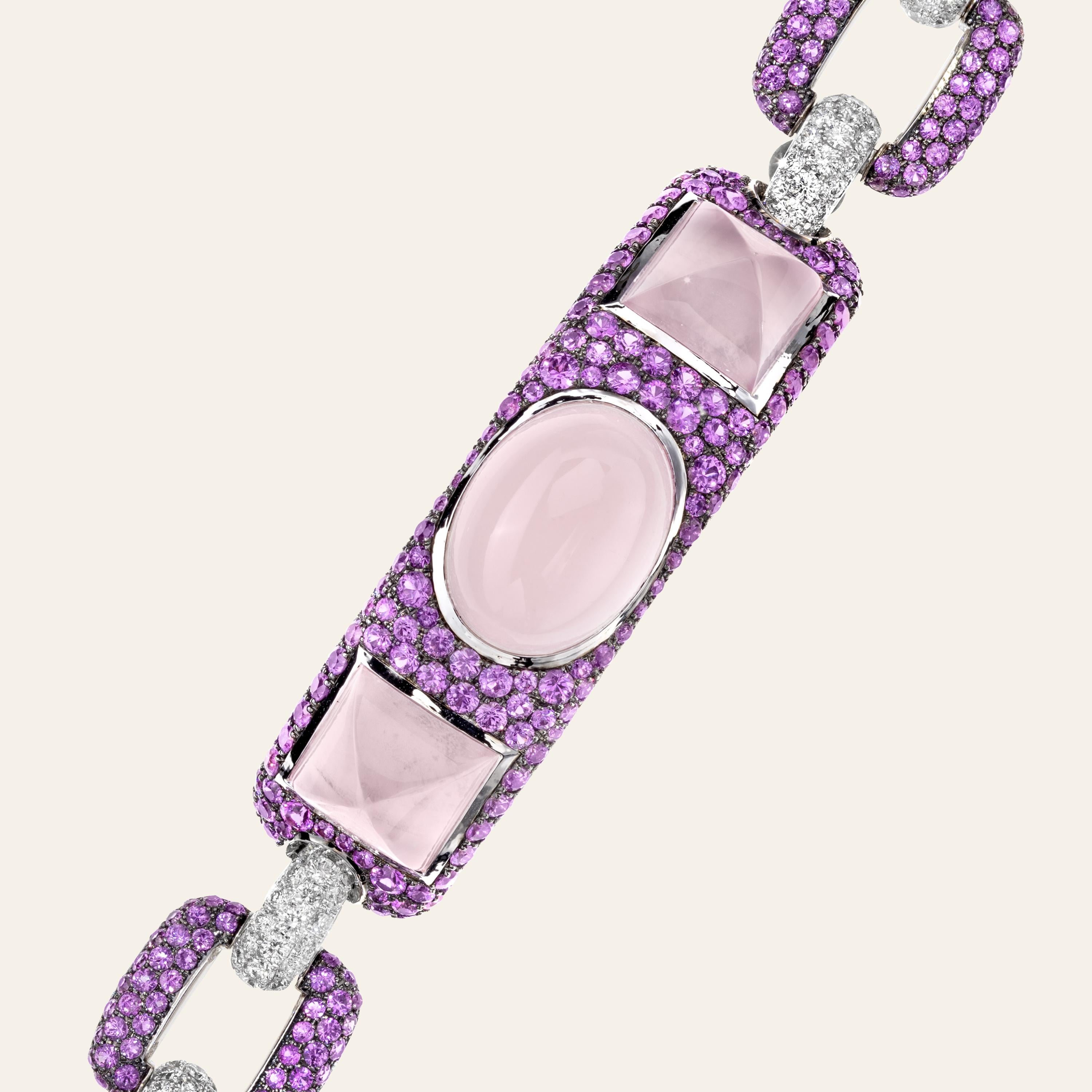 Sabbadini Pink Quartz & Sapphire Cuff Bracelet 
18k White gold bracelet, cabochon pink quartzes, pink sapphire pavé 12,01ct and diamond pavé 2,60ct. Gold 32,53
Handmade & designed in Milan, in Via Montenapoleone.
This item comes directly from the