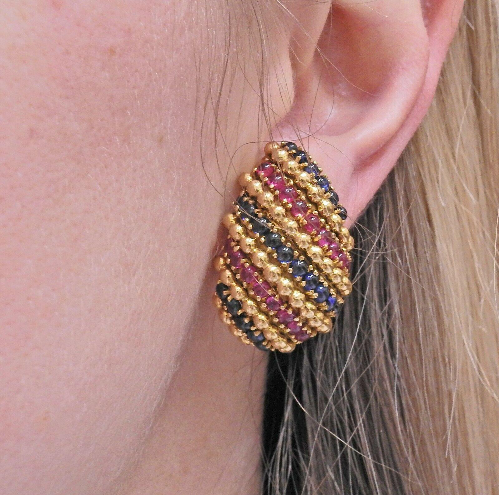 Pair of 18k gold cocktail earrings by Sabbadini, with sapphires and rubies.  Earrings are 31mm x 20mm, weight 35.7 grams. Marked: Sabbadini, 750, Italian mark.