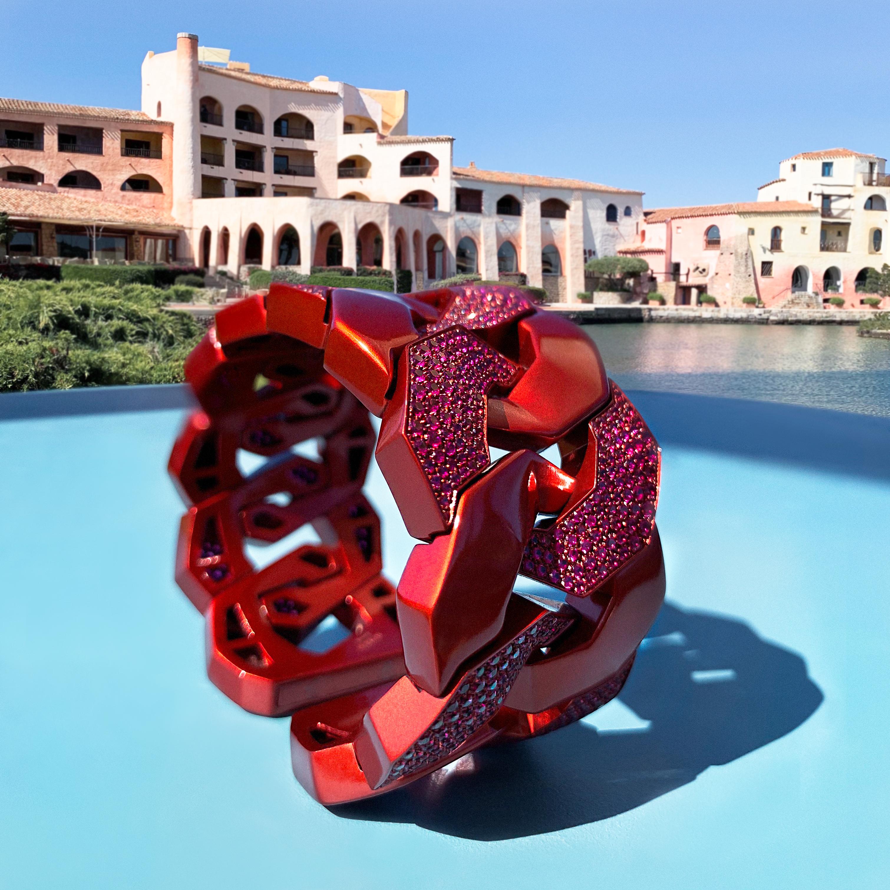 Sabbadini Titanium & Rubies Micropave, Dark Red Griffes Bracelet
Rubies 8,69 Carats.
The innovative use of titanium combined with precious stones, makes this bracelet incredibly flexibile and light.
Hand made jewelry & designed in Milan, in Via