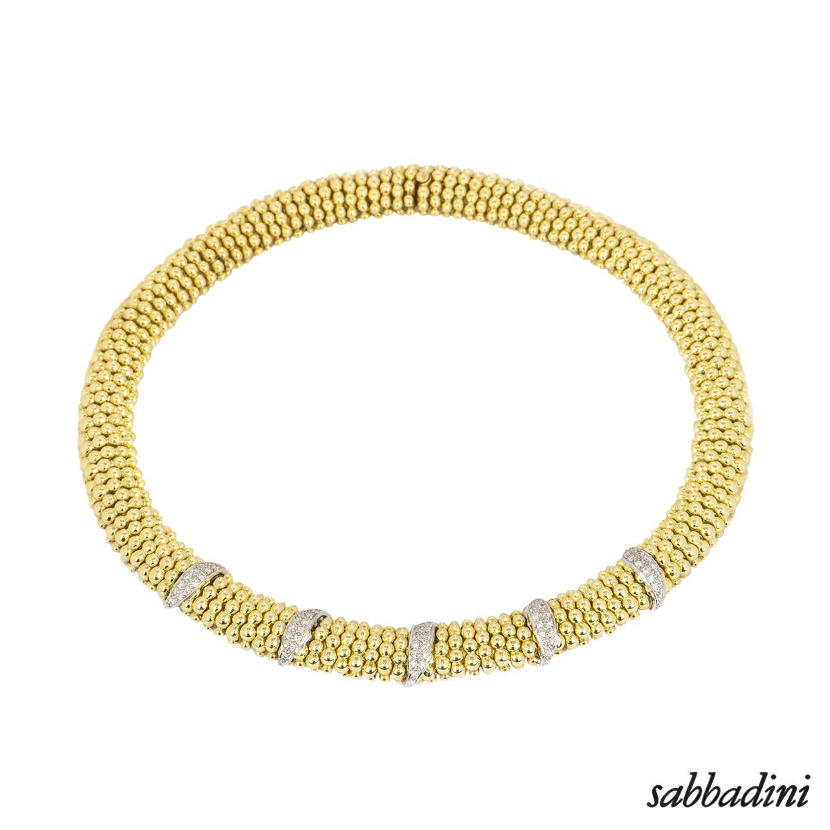 An 18k yellow gold diamond suite by Sabbadini. The suite consists of a bracelet, necklace and a pair of earrings pave set with round brilliant cut diamonds in a beaded ball design. The necklace features a total of 78 diamonds with an approximate