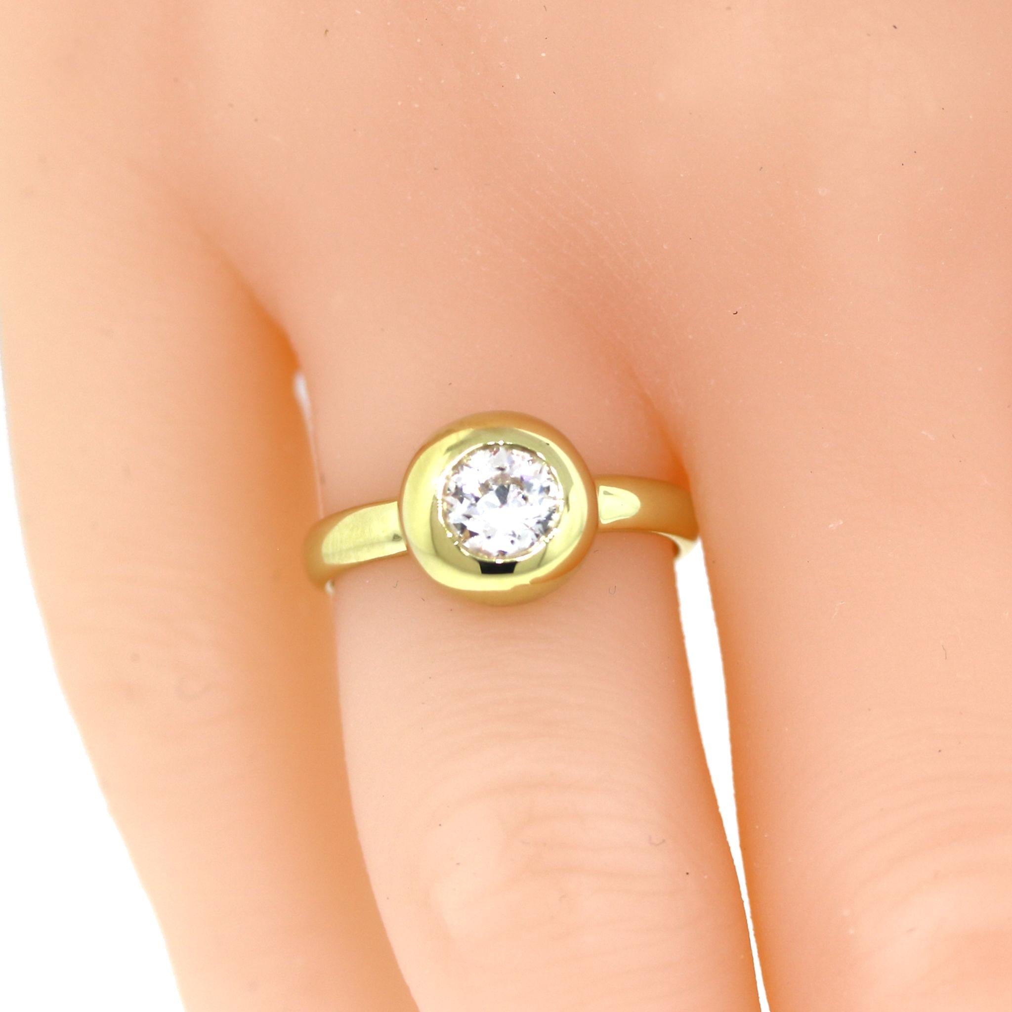 18 kt Yellow Gold
Diamond: 0.68 ct twd
Color: I-J
Clarity: SI2
Ring Size: 6
Total Weight: 4 grams