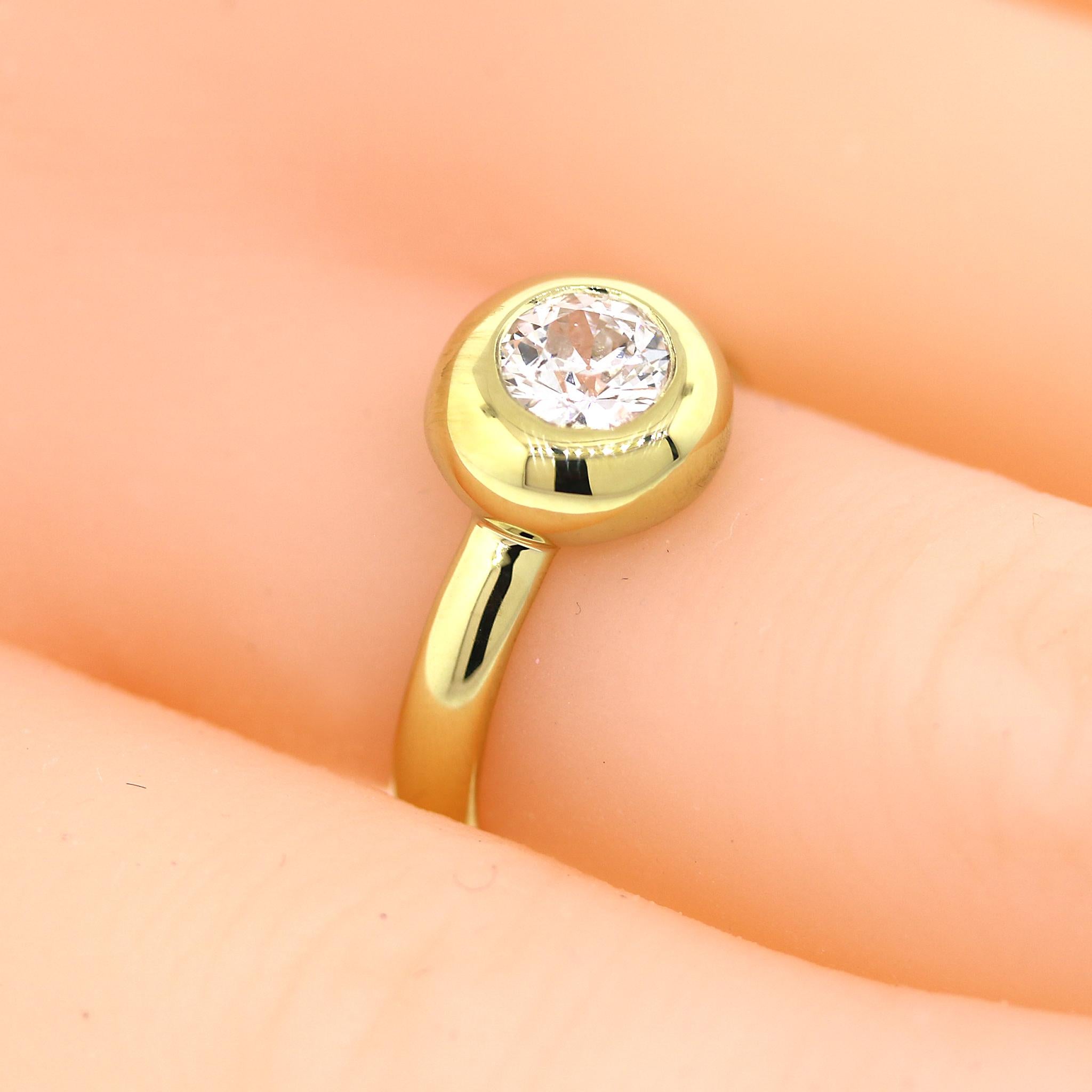 Sabel Round Brilliant Cut Diamond Bezel Set Engagement Ring For Sale 1