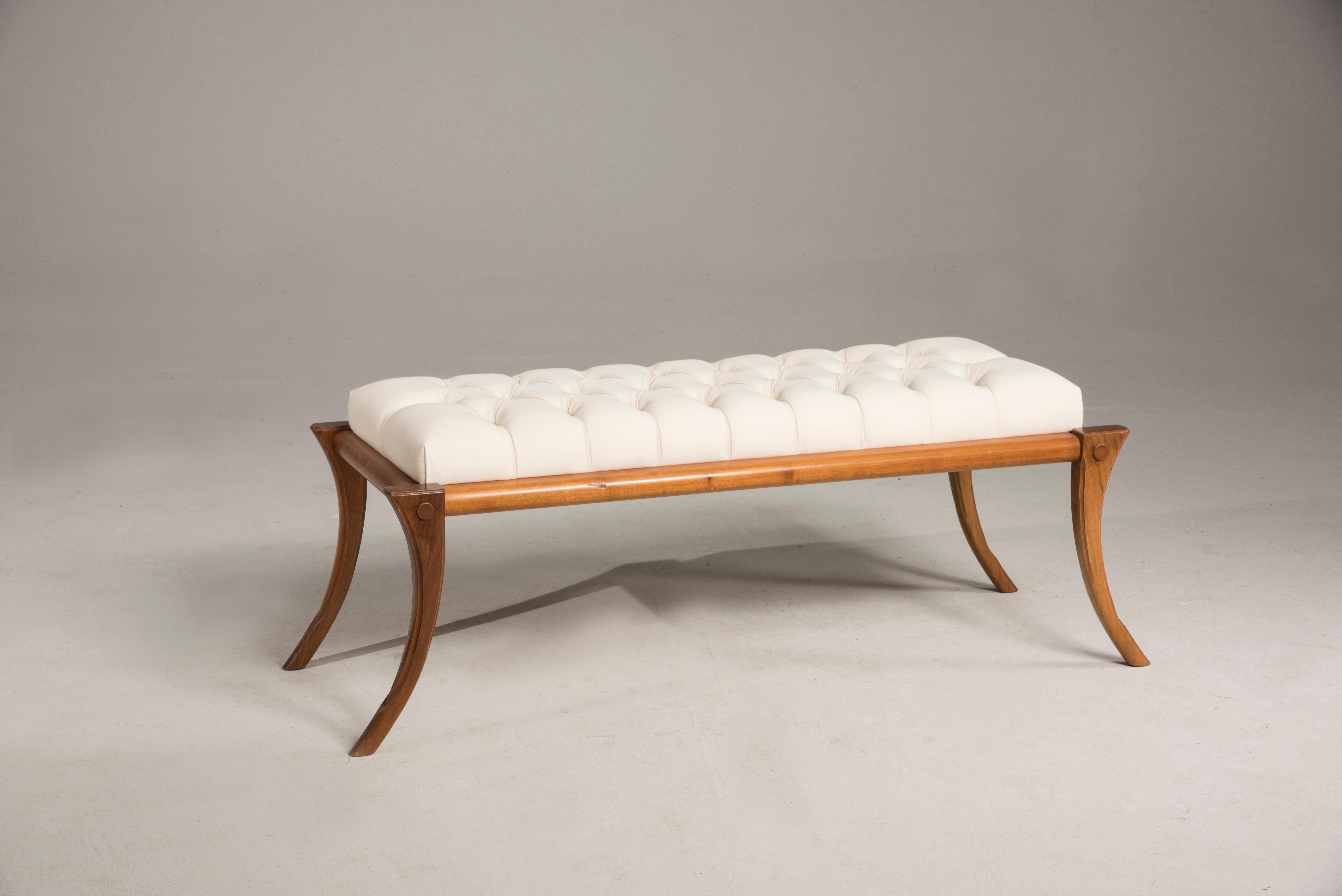 Saber legs walnut wood milk light color seat bench, Customizable upholstery and wood.

Other colors and upholstery are available. Italian artisanal production by Pescetta Home Decoration.

Walnut wood bench made in Italy. It is realized according to