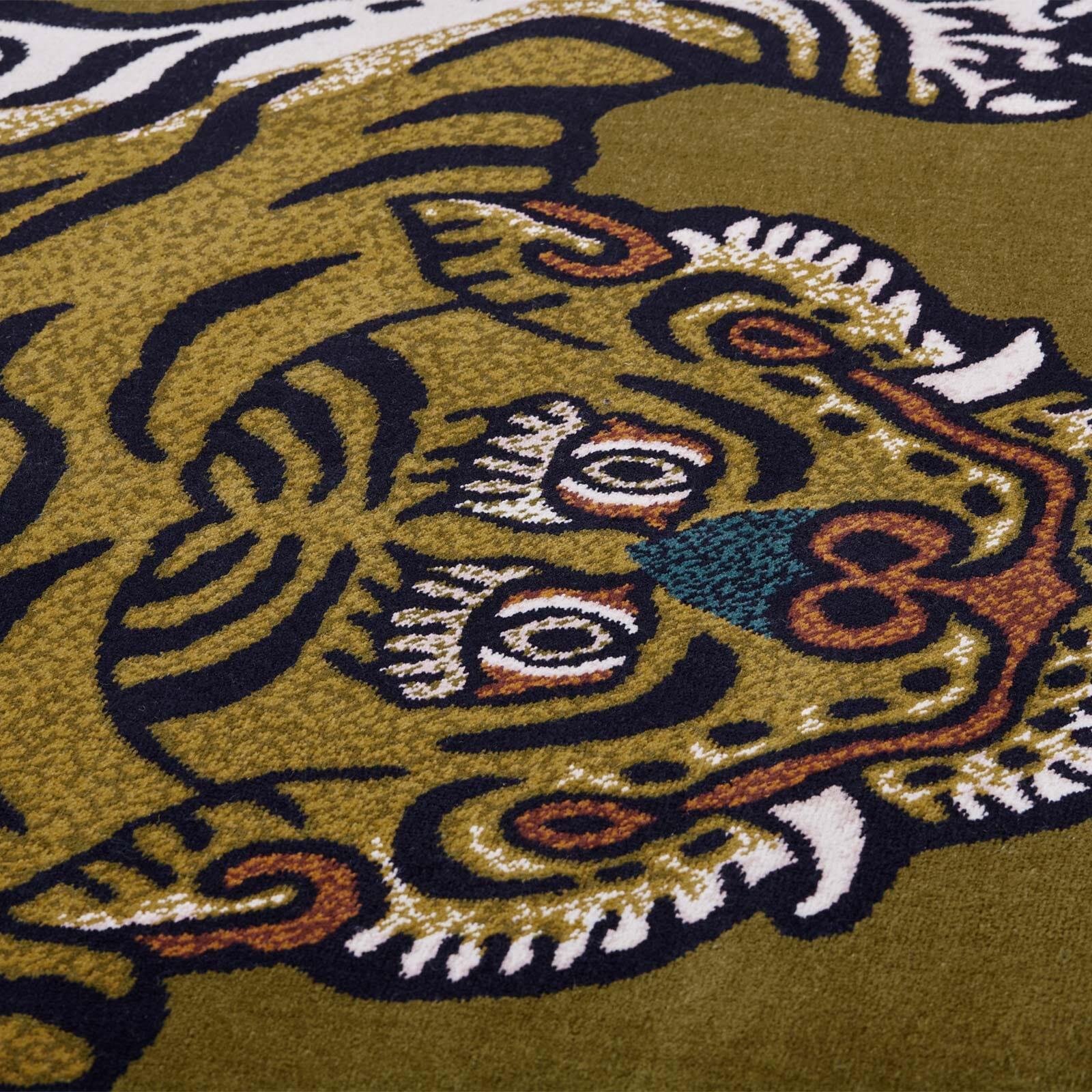 Seeing as our iconic SABER motif was inspired by traditional Tibetan tiger rugs, it was only a matter of time before the fierce feline took to the floor and, it was worth the wait. Woven at the historic Axminster Carpets in Devon, this design is the