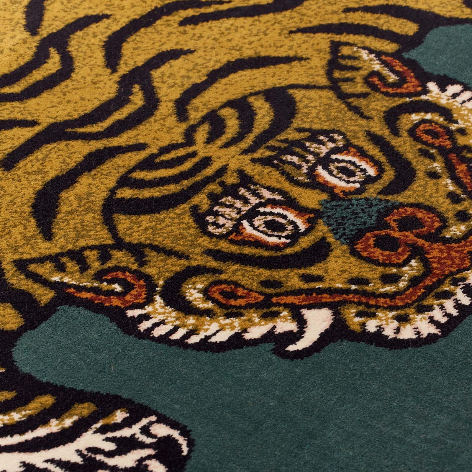 You can't help but notice an Axminster rug just like you wouldn't be able to miss a tiger in the room. Crafted by the master weavers of Axminster Carpets at their factory in Devon, the SABER rug sees our fantastic beast (a now-iconic motif inspired
