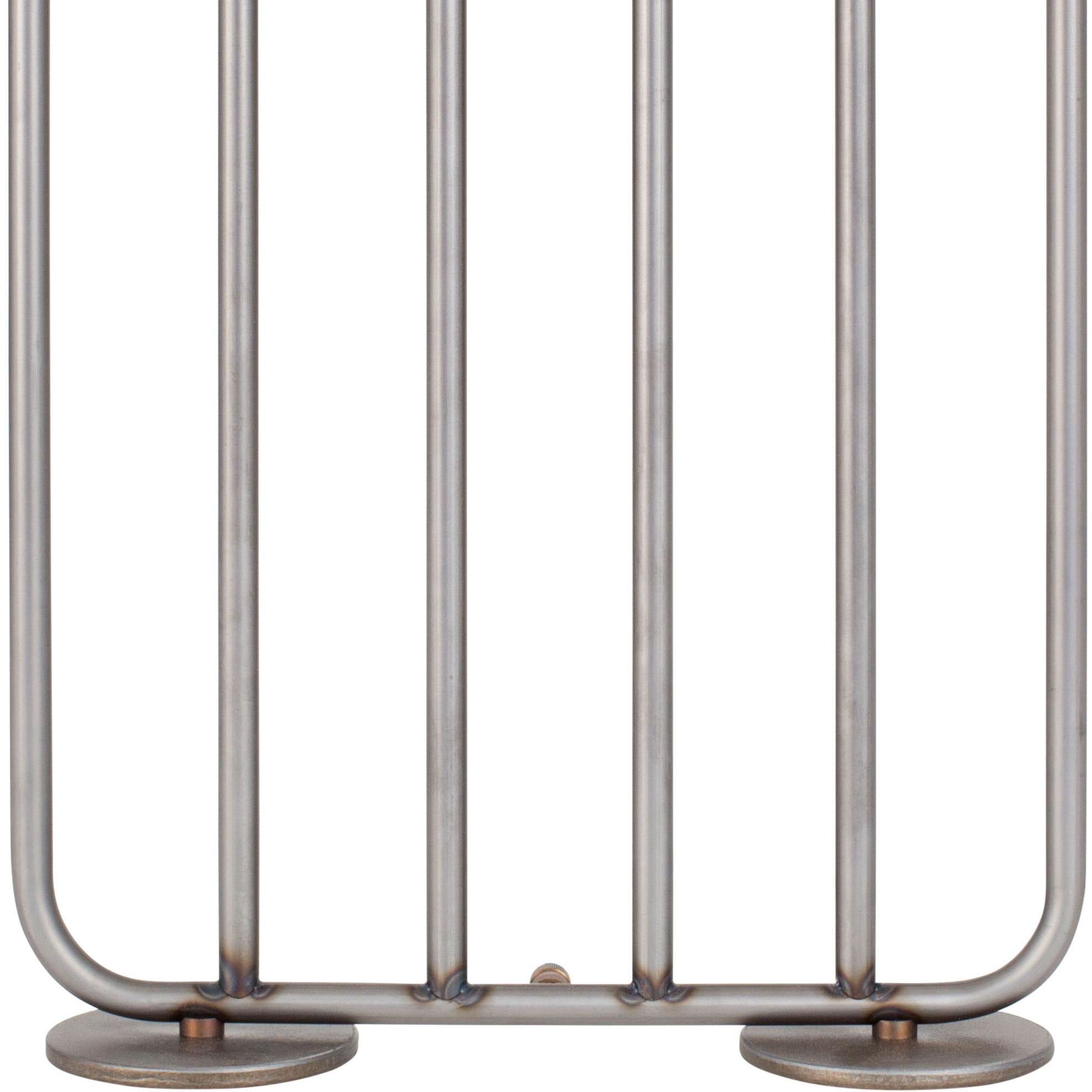 Table lamp model December raw iron with six arms designed by Sabina Grubbeson and manufactured by Konsthantverk.

The production of lamps, wall lights and floor lamps are manufactured using craftsman’s techniques with the same materials and