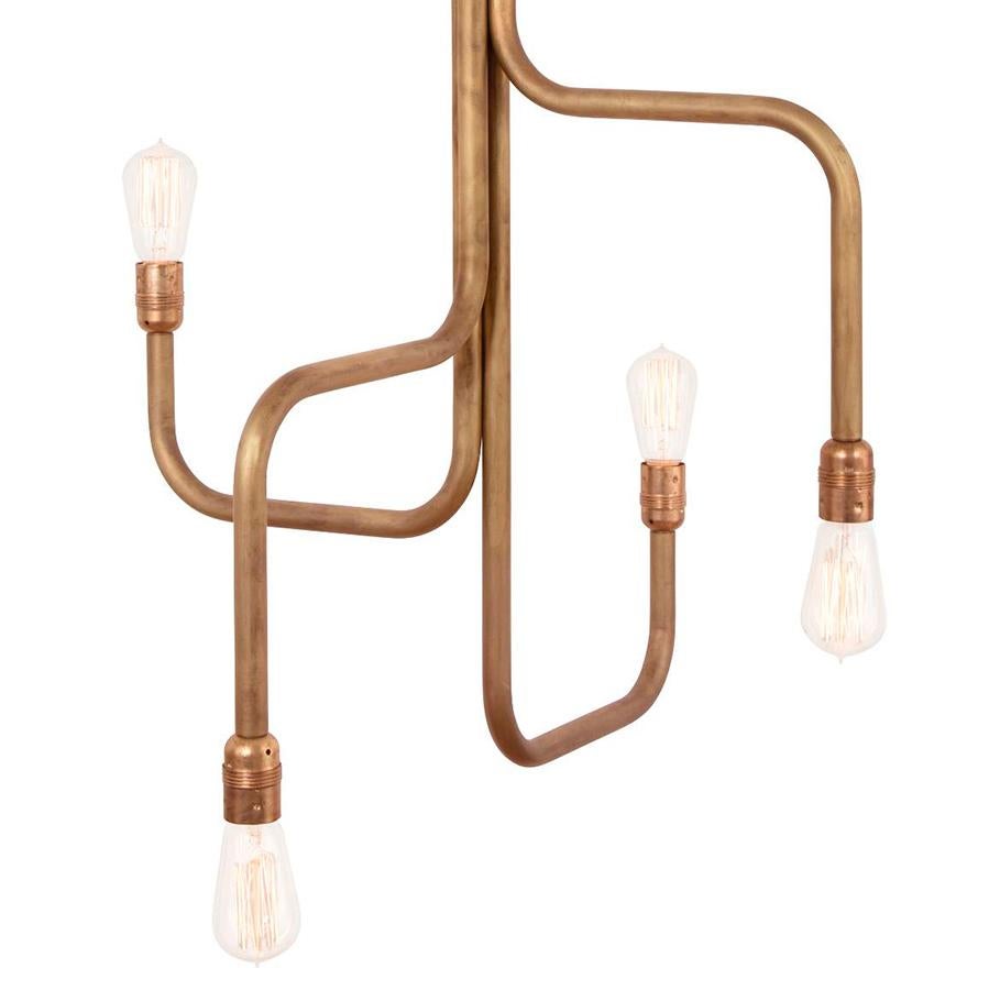 Ceiling lamp designed by Sabina Grubbeson manufactured by Konsthantverk Tyringe in Sweden.

Strapatz ceiling
D 650 mm
H 960 mm, 
cord 3 m Max 4 x 60 W E27 
3416-6 Raw brass 

The lamps are wiring with standard Europe wiring.

This lamp is wired for