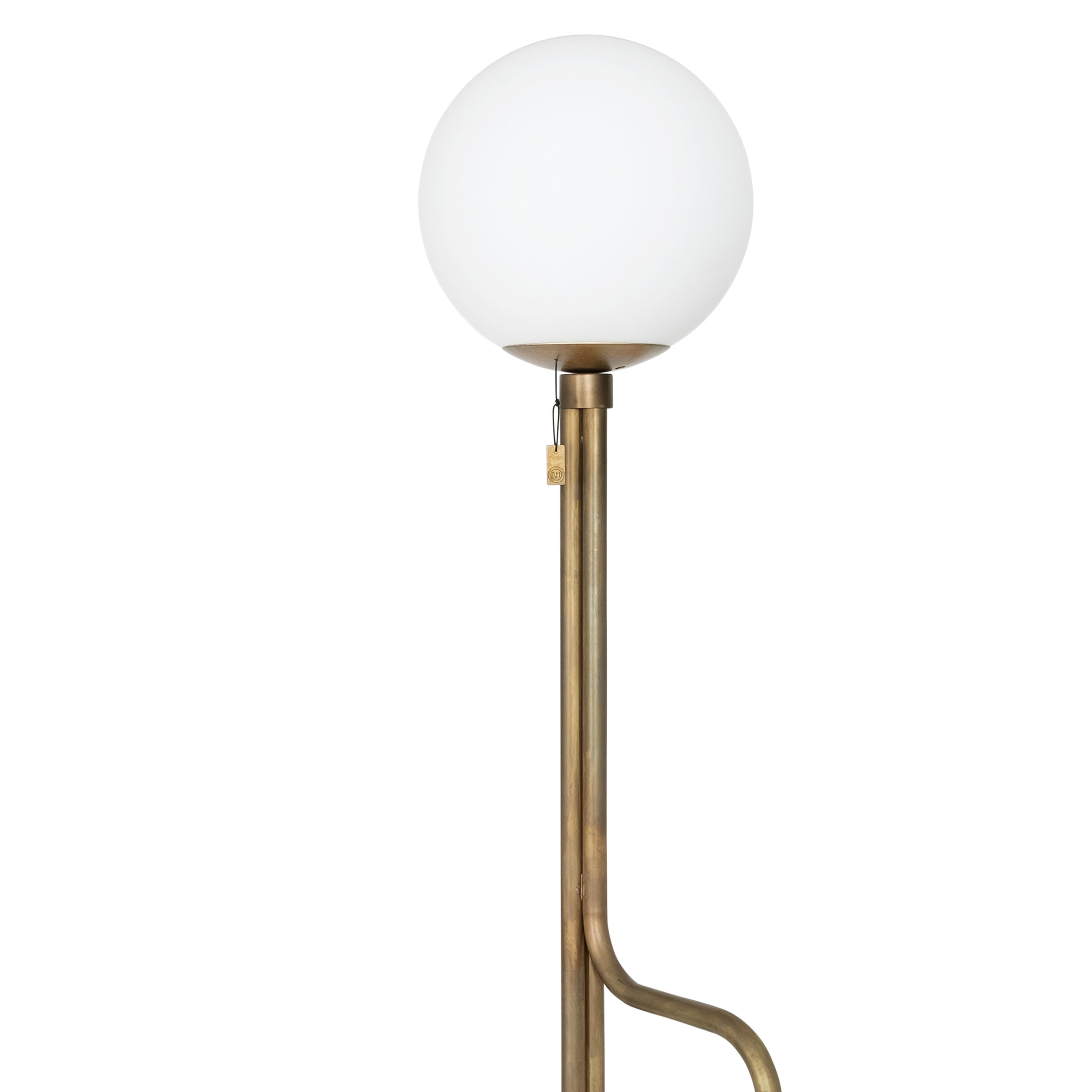 Floor lamp model Strapatz designed by Sabina Grubbeson and manufactured by Konsthantverk. 

The production of lamps, wall lights and floor lamps are manufactured using craftsman’s techniques with the same materials and techniques as the first