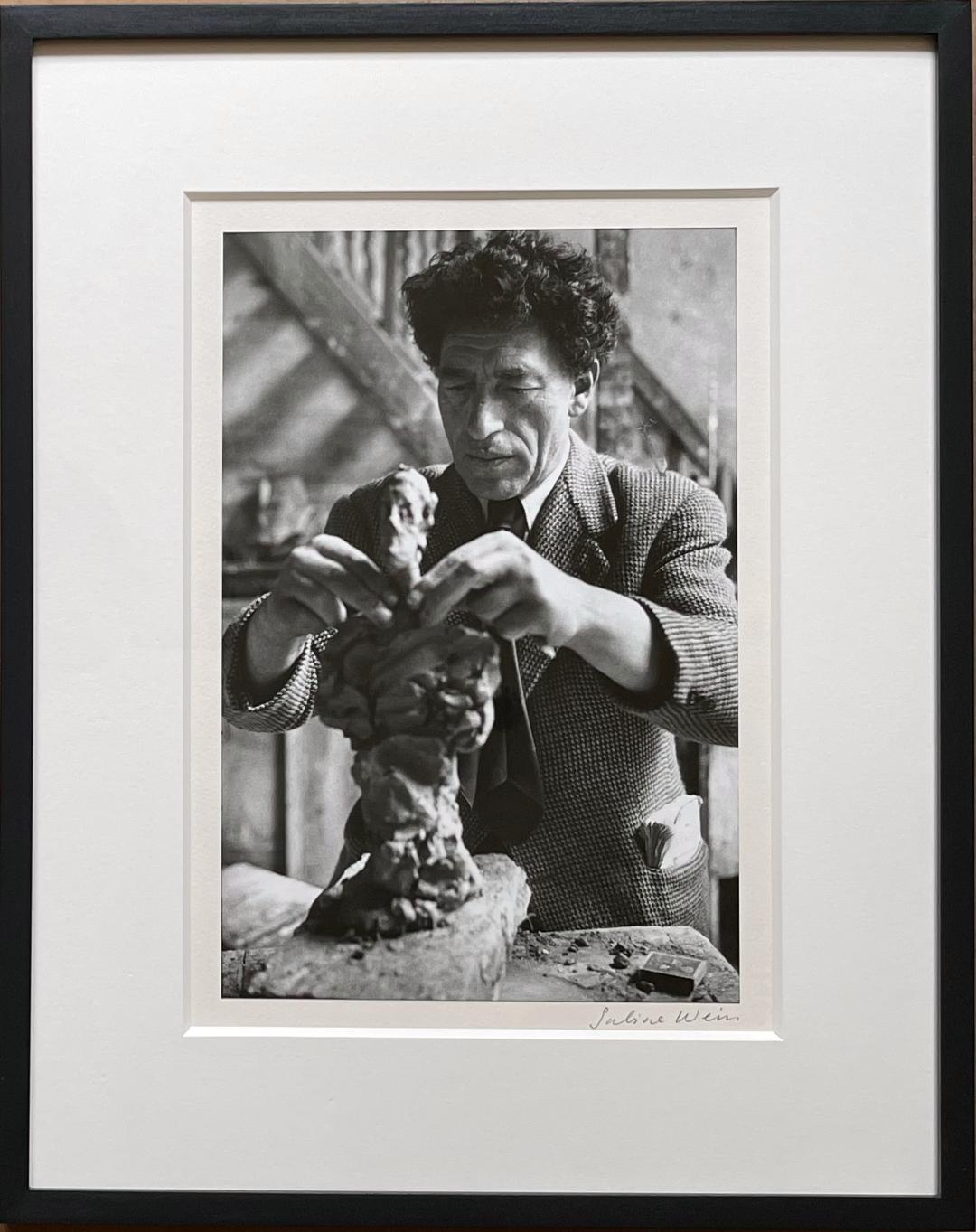 Sabine Weiss Black and White Photograph - Alberto Giacometti dans son Atelier, 1954 (Giacometti in his studio)
