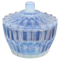 Sabino, France. Art Deco lidded jar in opaline art glass with a bluish tint. 
