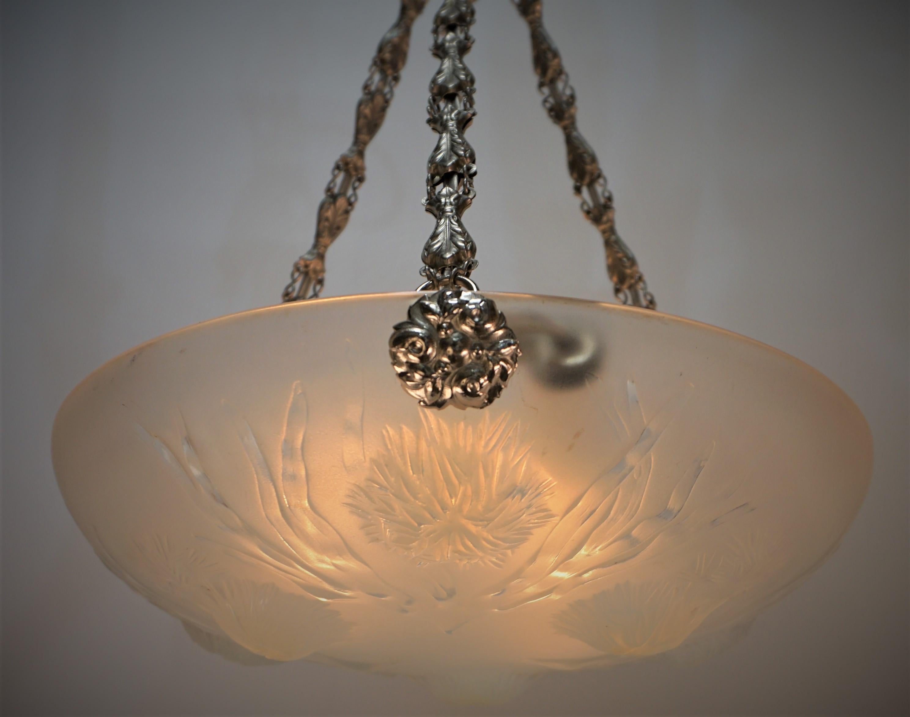 Fabulous 1920's sea urchin design opalescent glass and nickel on brass petit three light chandelier.
Marked Sabino France
Professionally rewired and ready for installation, 100 watts max each light blubs.