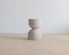 Sablia Muted Beige Travertine Hourglass Shaped Side Table by Beije Avenue
