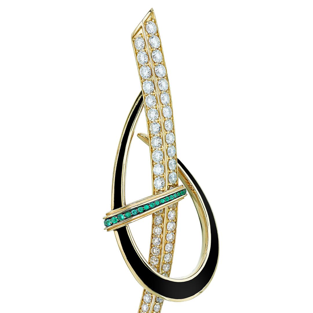 Sabre Couture Earrings; 18 carat gold, 7.37 carat of brilliant diamonds and emerald pave-set; sleek, minimal, opulent. Articulated lines swoop against the organic inspiration of Pan-African Art. Leane signals waves of change in the luxury market