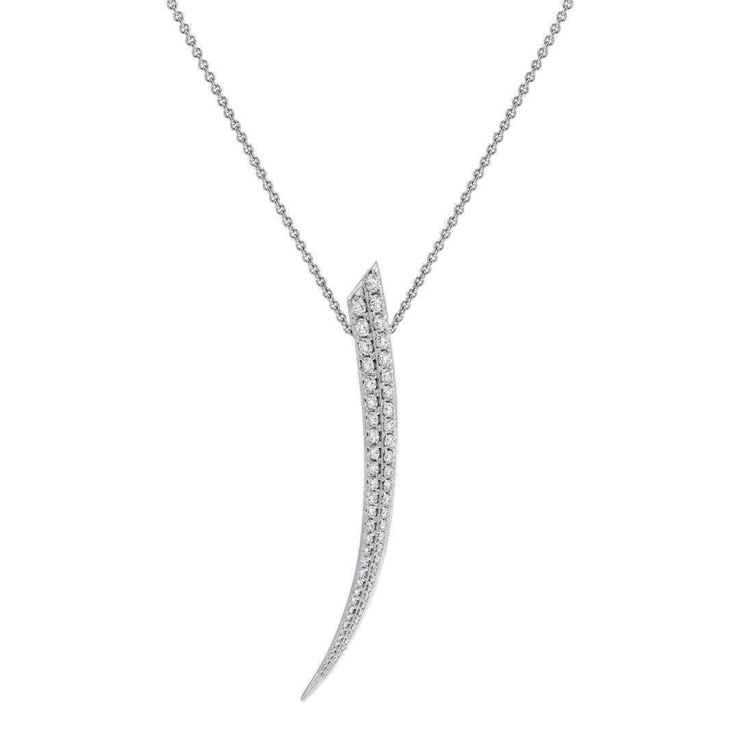 Sabre Fine Large Necklace is handcrafted from 18ct white gold and 2.64cts of brilliant white diamonds. The Sabre silhouette encapsulates a simple premise - the singular line on a curve. Double rows of diamond pavé plunge the neck of the wearer, in a