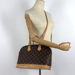 Sac à main LOUIS VUITTON Alma MM toile et cuir marron 2001