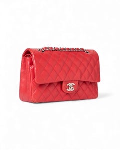 Sac baguette Fendi mini en cuir marron avec finitions argentées. Il est doté d'u