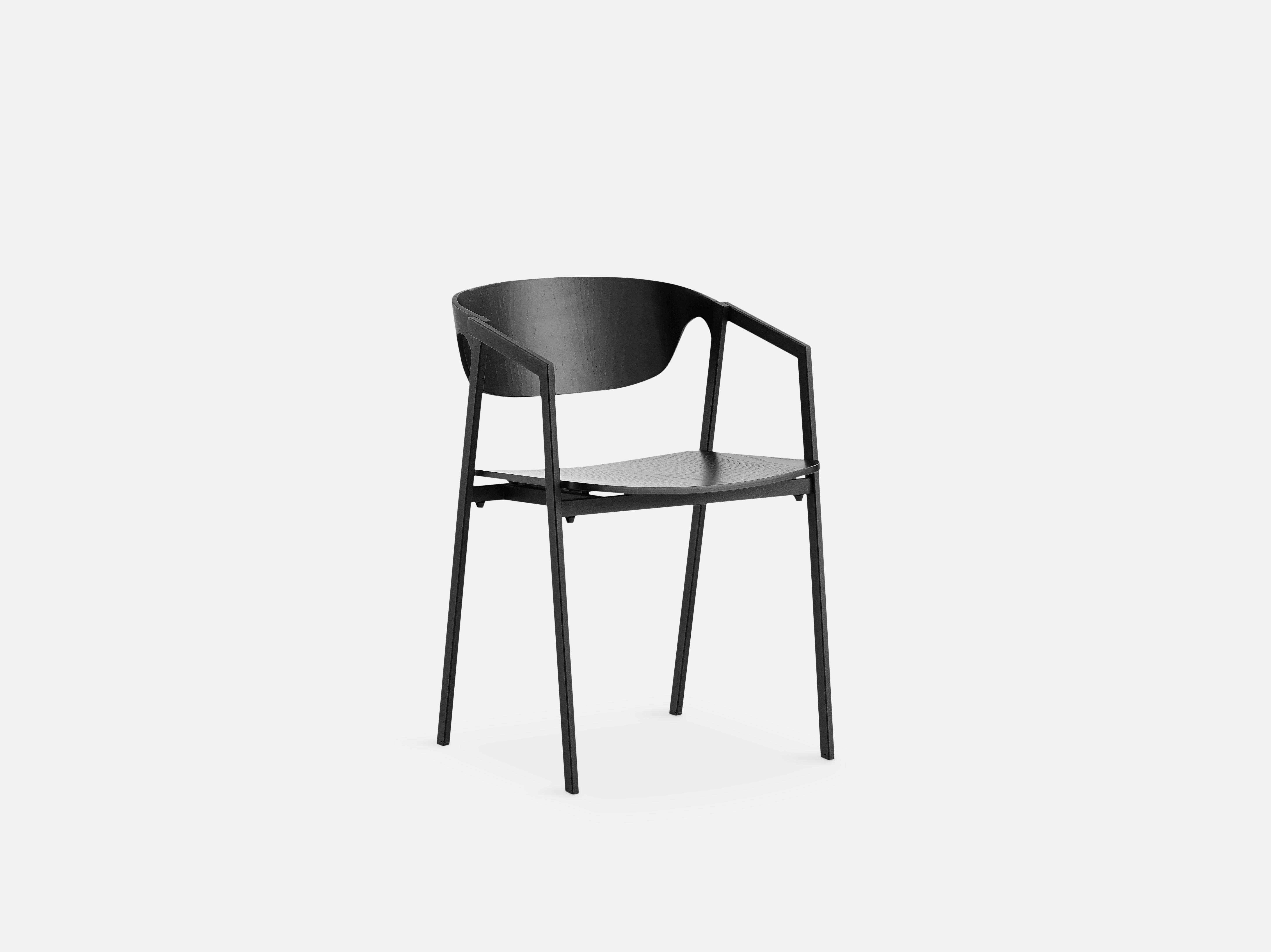 S.A.C. black dining chair by Naoya Matsuo
Materials: Metal, plywood with oak veneer
Dimensions: D 50 x W 48.3 x H 72.5 cm
Also available in different colors and finishes.

The founders, Mia and Torben Koed, decided to put their 30 years of