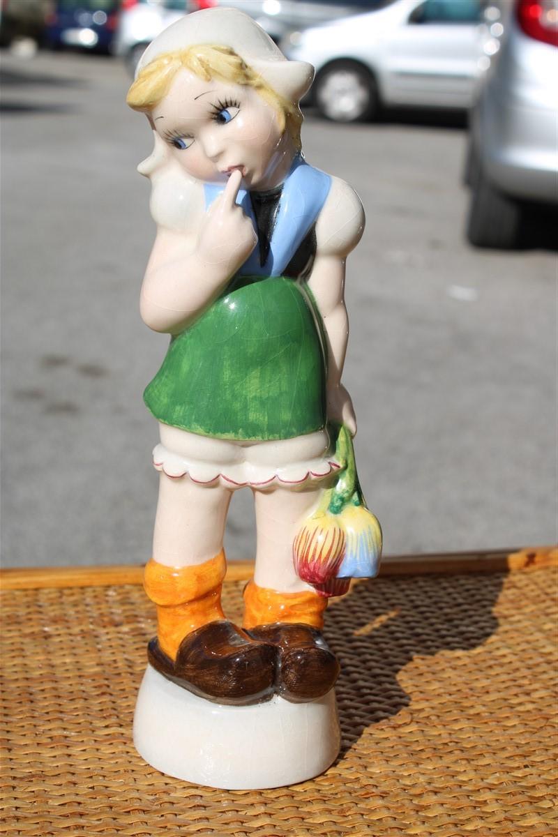 This delightful figurine fully represents the style of the Austrian artist.