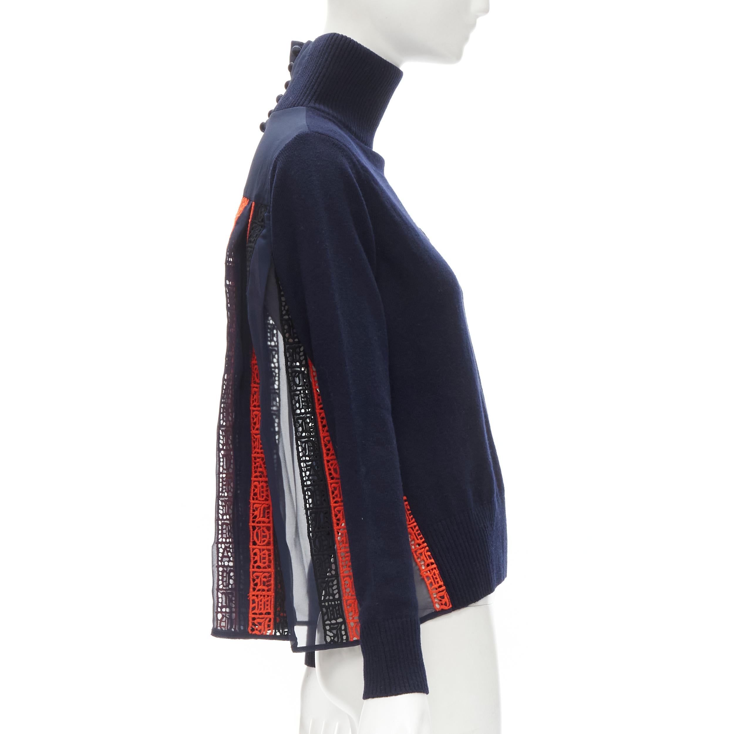 SACAI 100% wool navy red striped embroidery anglais flared turtleneck JP1 S
Brand: Sacai
Designer: Chitose Abe
Collection: 2016 
Material: 100% Wool
Color: Navy
Pattern: Solid
Closure: Button
Extra Detail: Crepe silk flared back with embroidery
