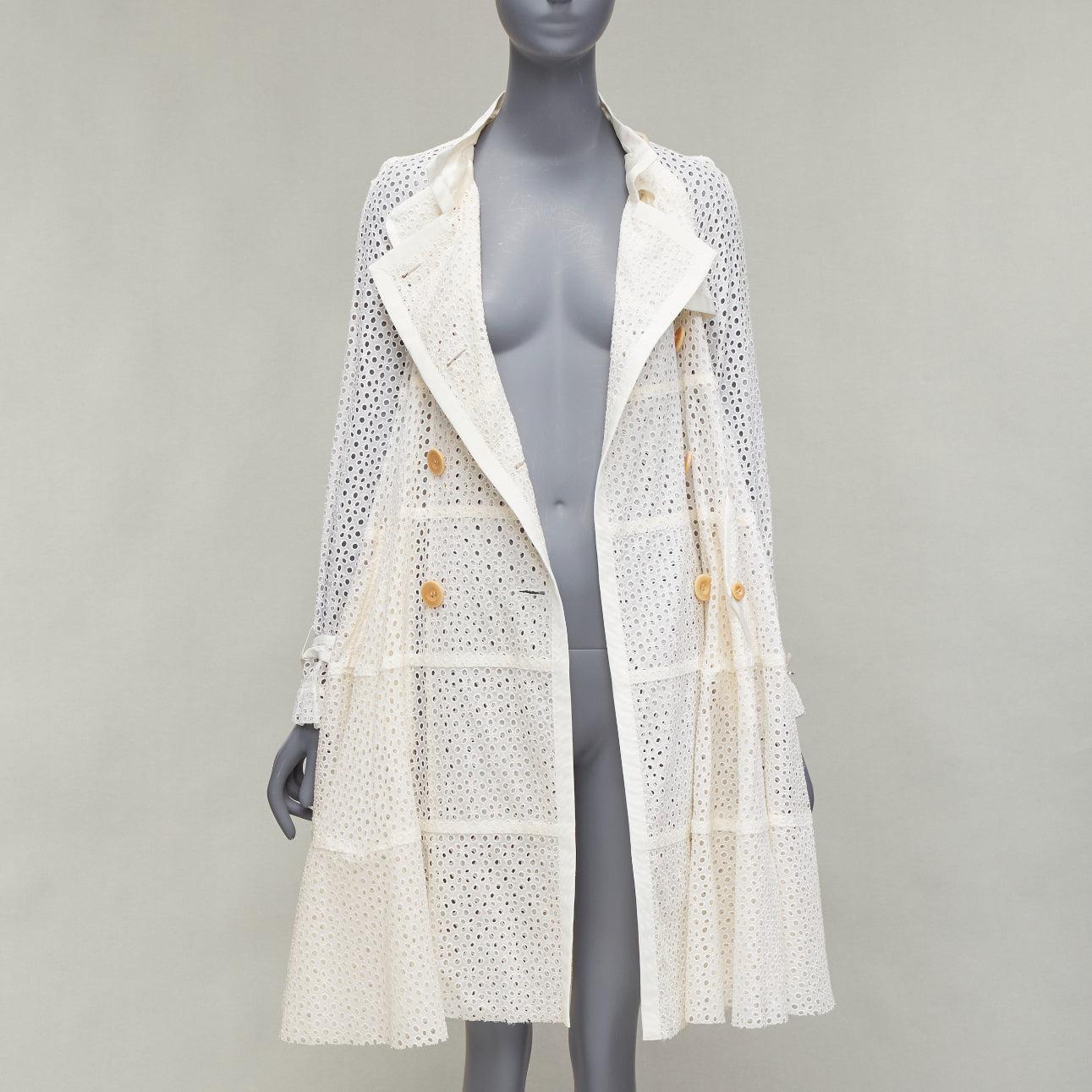 SACAI 2012 cream eyelet embroidery anglais double breast belted flared coat JP3 L
Reference: DYTG/A00014
Brand: Sacai
Designer: Chitose Abe
Collection: 2012
Material: Cupro
Color: Cream
Pattern: Lace
Closure: Belt
Extra Details: Tiered panels