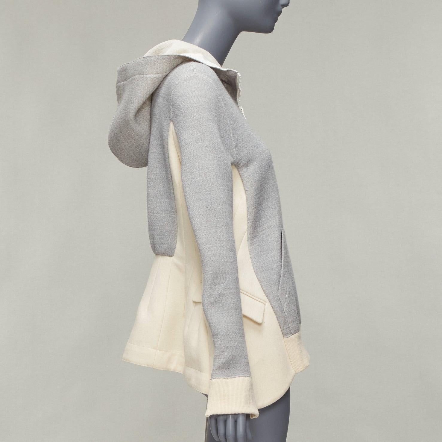 SACAI 2014 grey cream hybrid reconstructed flared back hoodie JP3 L
Reference: DYTG/A00031
Brand: Sacai
Designer: Chitose Abe
Collection: 2014
Material: Wool, Blend
Color: Grey, Cream
Pattern: Solid
Closure: Zip
Lining: White Fabric
Extra Details: