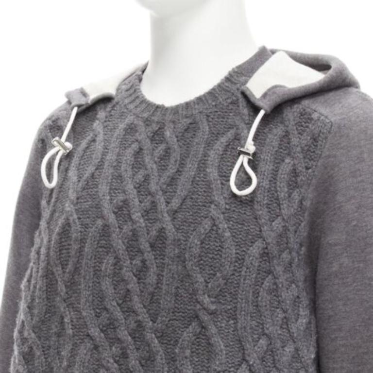SACAI 2015 grey 100% wool cable knit contrast hood sweater JP3 L
Reference: CAWG/A00296
Brand: Sacai
Designer: Chitose Abe
Collection: 2015
Material: Wool
Color: Grey, White
Pattern: Solid
Closure: Pullover
Made in: Japan

CONDITION:
Condition: