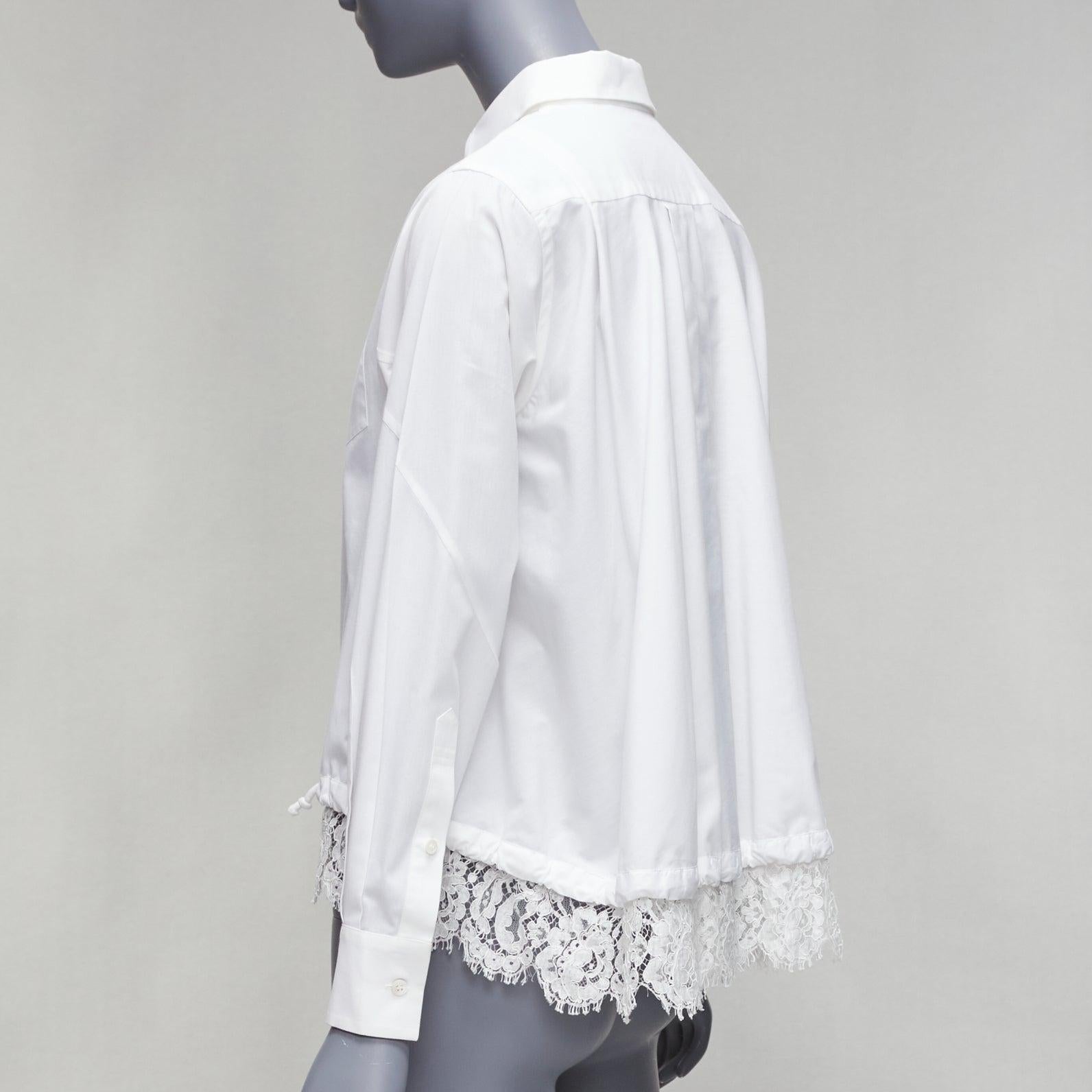 SACAI 2015 white floral lace hem bungee cord pocketed cropped shirt JP1 S
Reference: EALU/A00003
Brand: Sacai
Collection: 2015
Material: Polyester, Blend
Color: White
Pattern: Lace
Closure: Button
Extra Details: Darted shoulders and pleats at