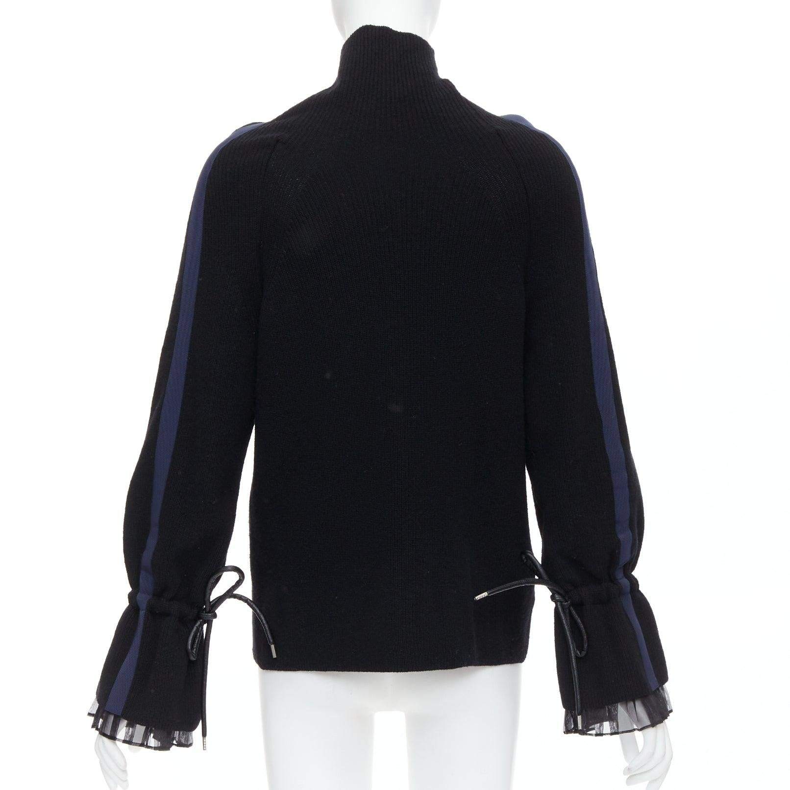 Sacai 2017 top à col roulé en laine mélangée noire et bordée de bleu marine JP1 S Pour femmes en vente